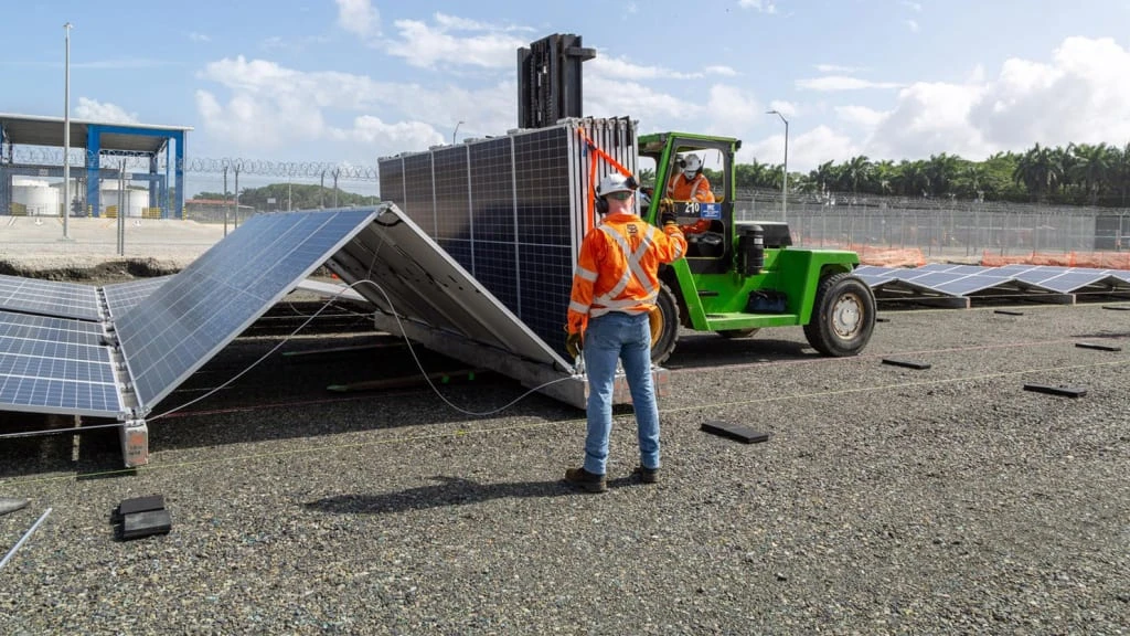 These fold-up solar panels can cover a field in a single day