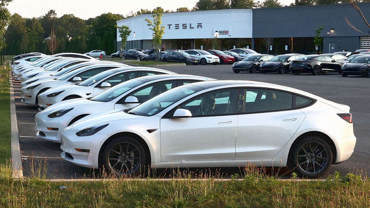 Unsold EVs are piling up at car dealerships. What does that mean for the auto industry?