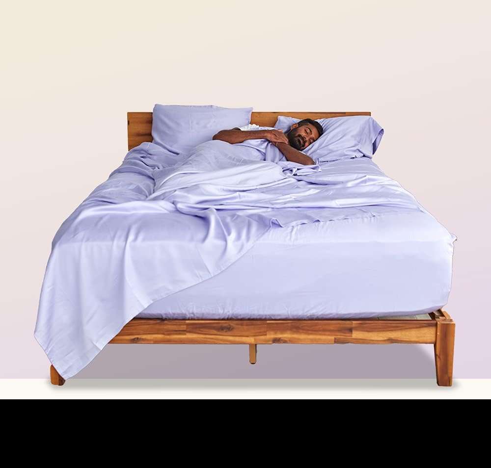 32 Sustainable Bedding Brands (& Deals You Can Score On Them)