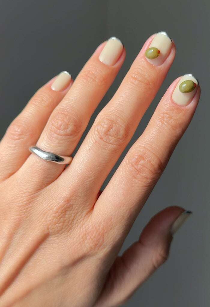 The ‘Dirty Martini’ Manicure Is The Top Holiday Nail Trend