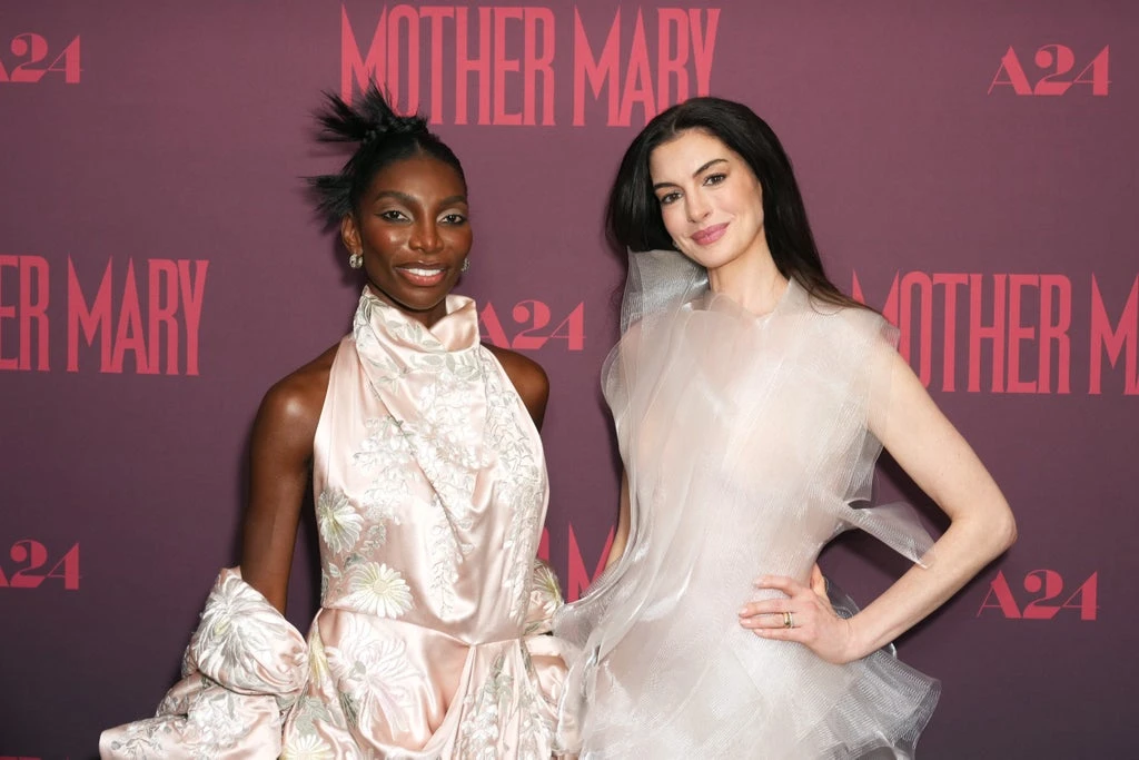Anne Hathaway & Michaela Coel Talk Mother Mary, Fame & Knowing When To “Hibernate”