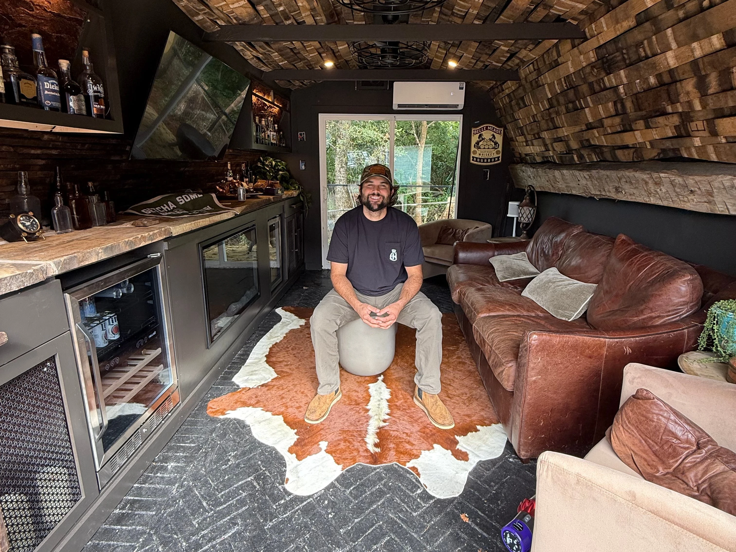 A man spent $3,000 transforming his old tool shed into an impressive man cave that doubles as a whiskey and cigar lounge