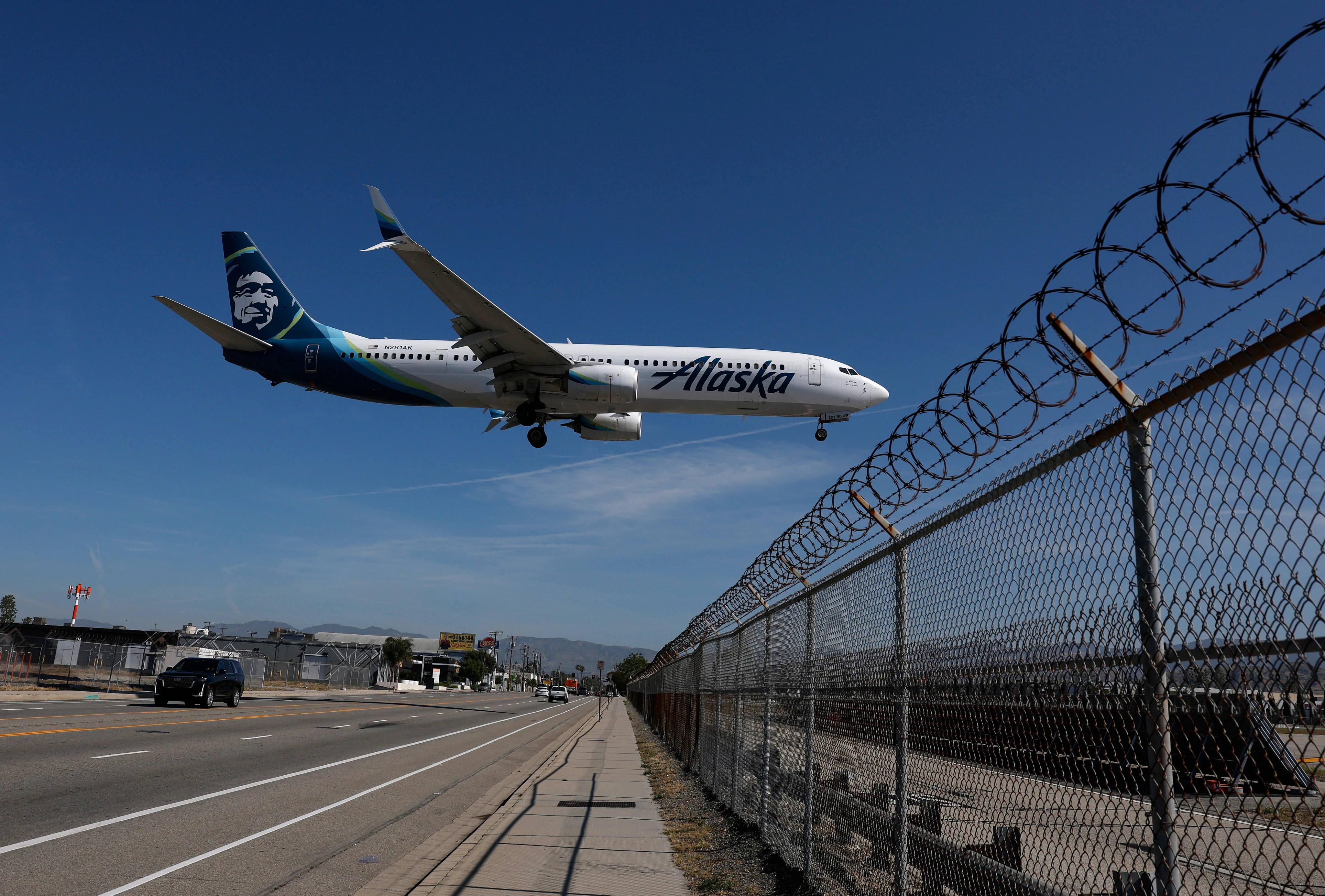 Airlines are absorbing up to 50% of surging jet fuel costs. Alaska is still betting on premium international flights