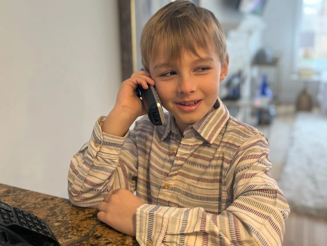 Most parents manage their kids' social lives. I expect my 8-year-old to do it himself.