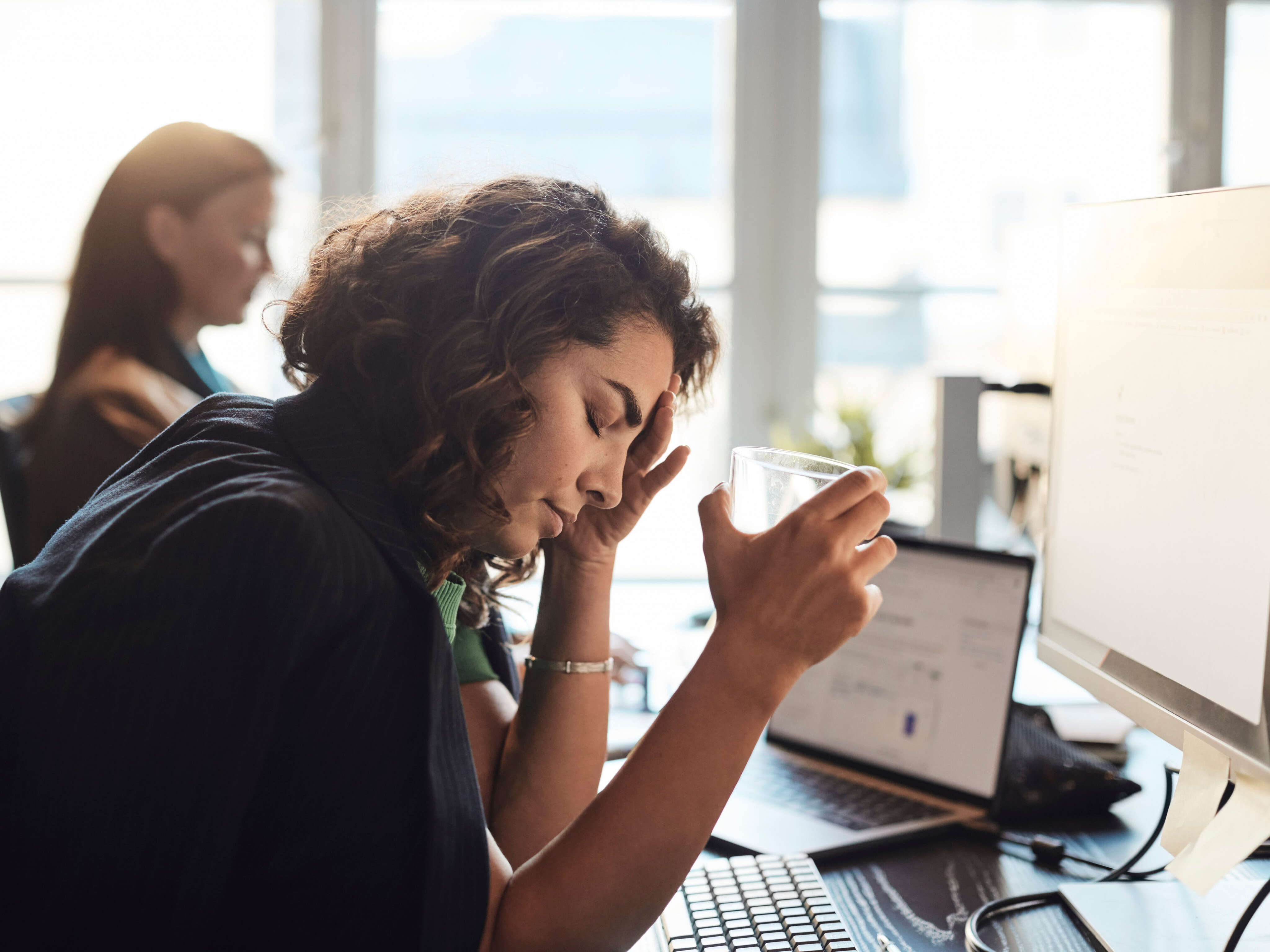 My coworker asked if I was pregnant, and I wasn't. The confrontation made me spiral, and I debated whether to tell my boss.