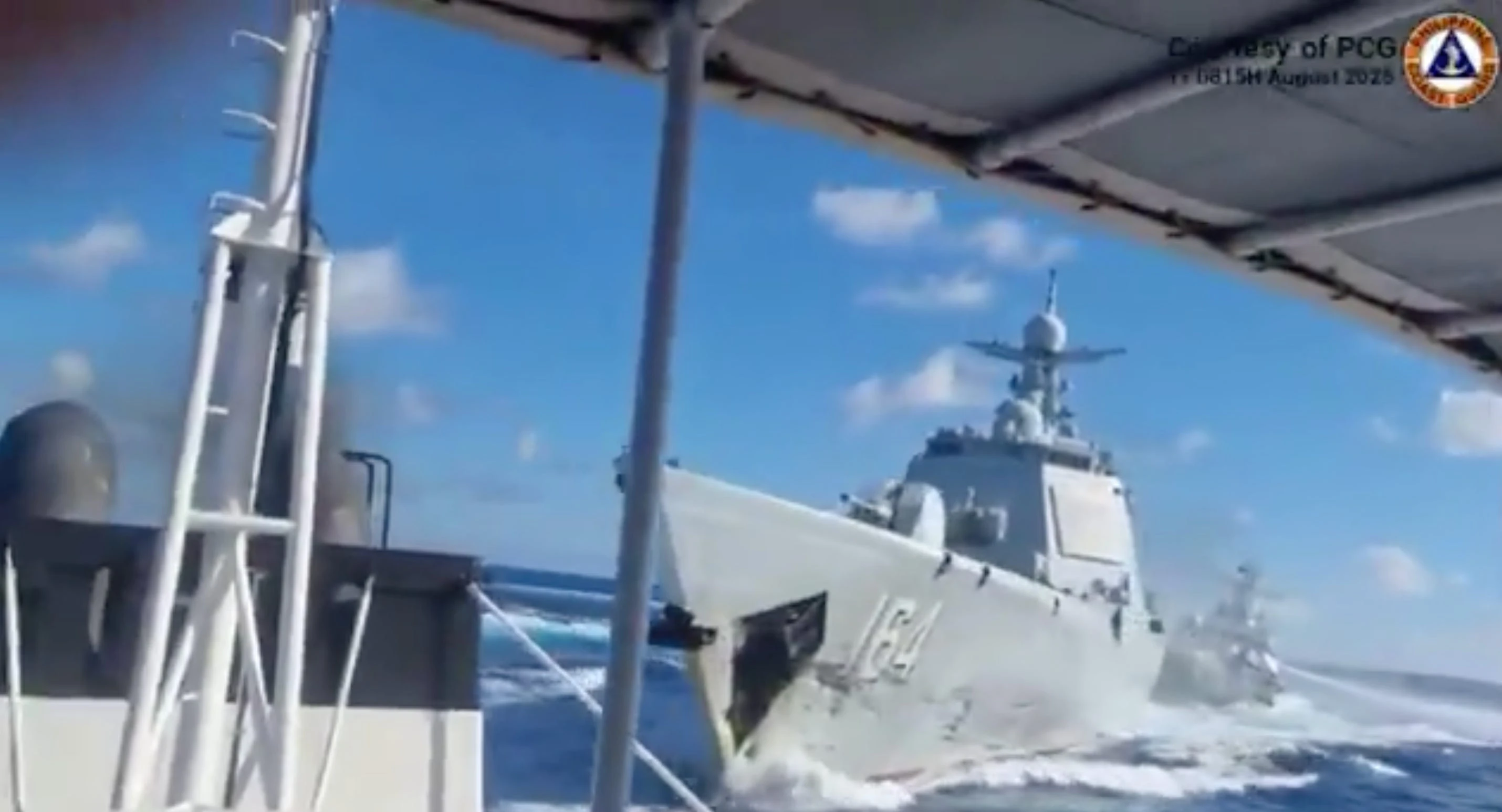 Chinese ships slam into one another during a South China Sea chase, Philippine Coast Guard video shows