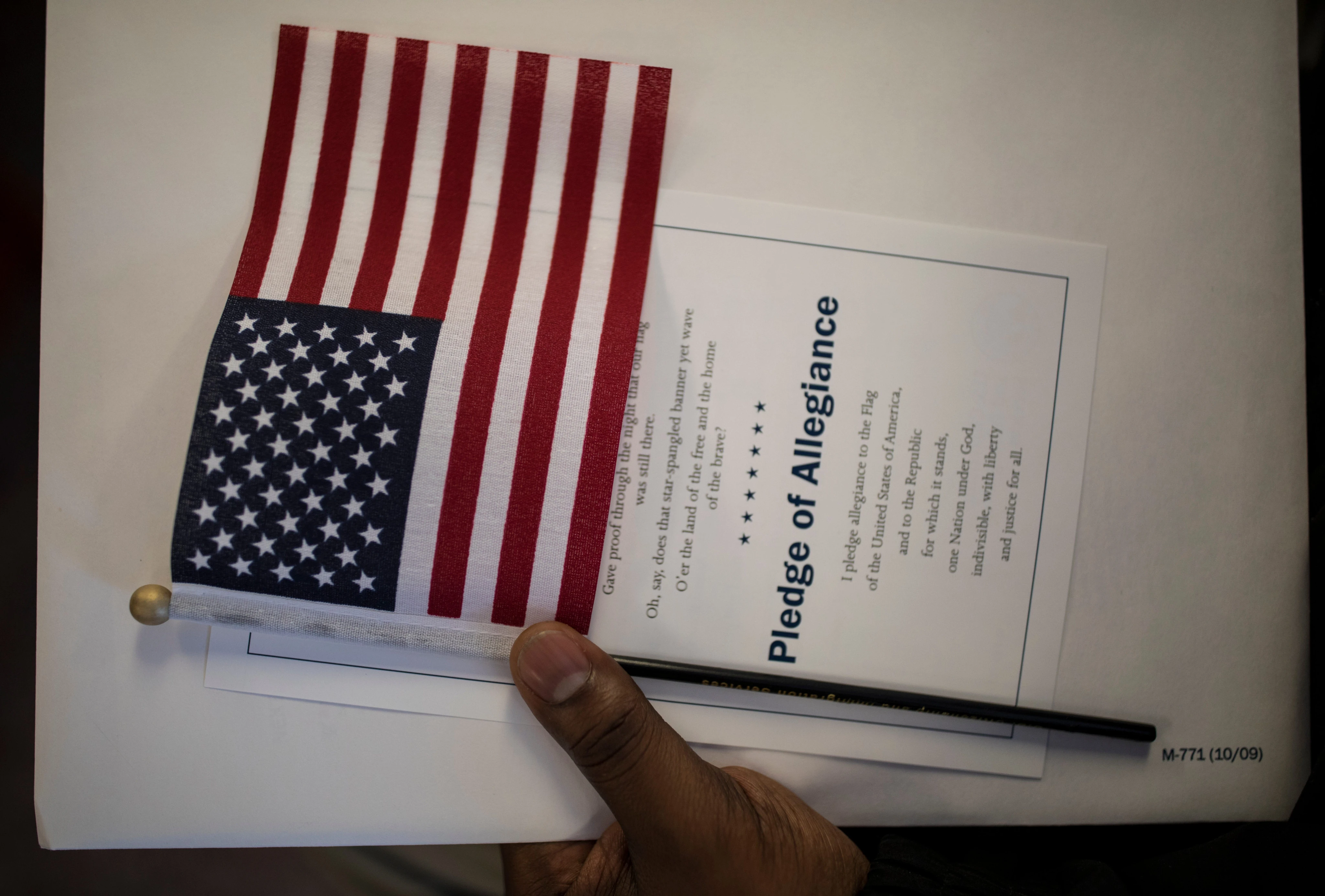 What smart people are saying about the Trump administration's green card crackdown