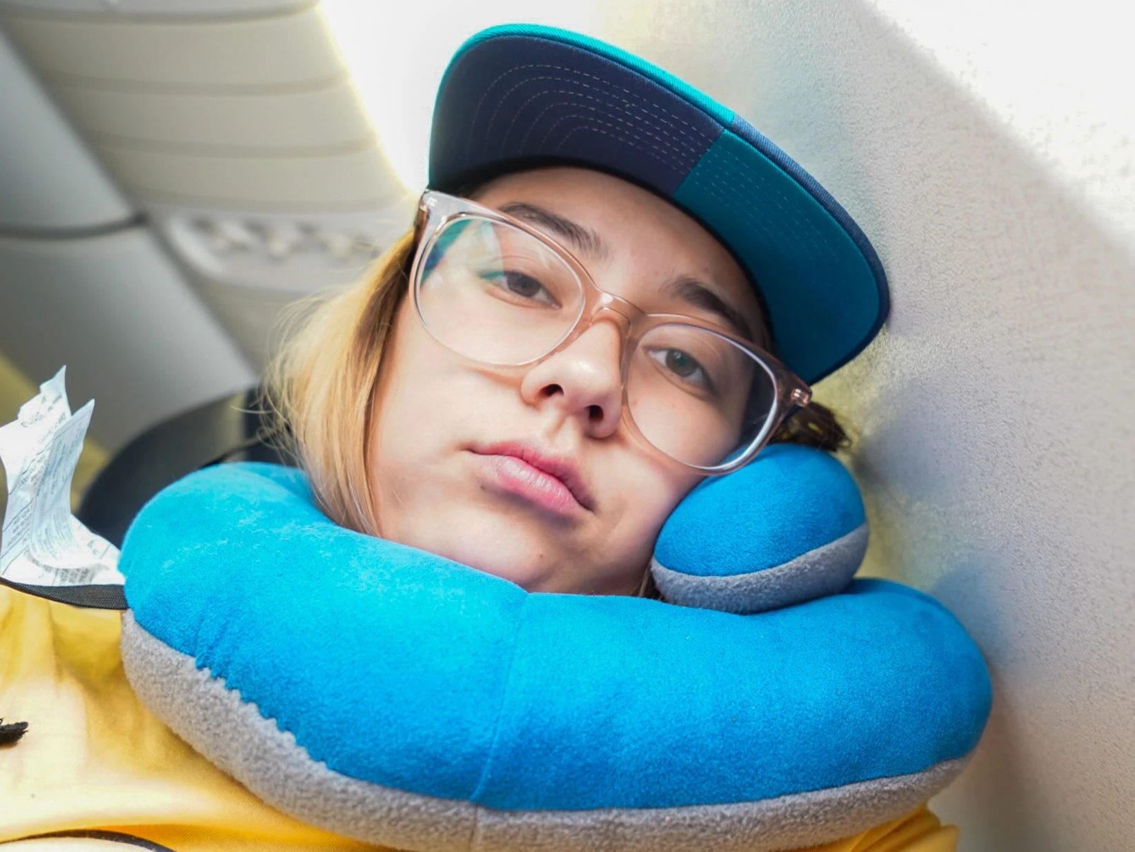 I've spent 190 hours on long-haul flights. Here are 11 tips for surviving 6 or more hours stuck in economy.
