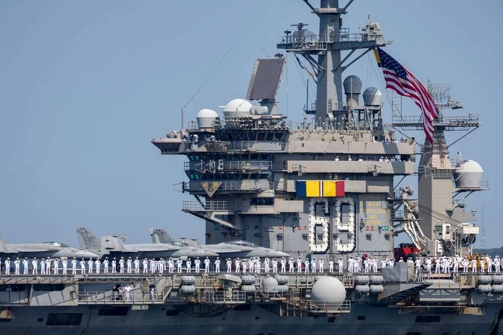 Photos show the USS Eisenhower carrier strike group's 9-month deployment leading the ferocious Houthi fight