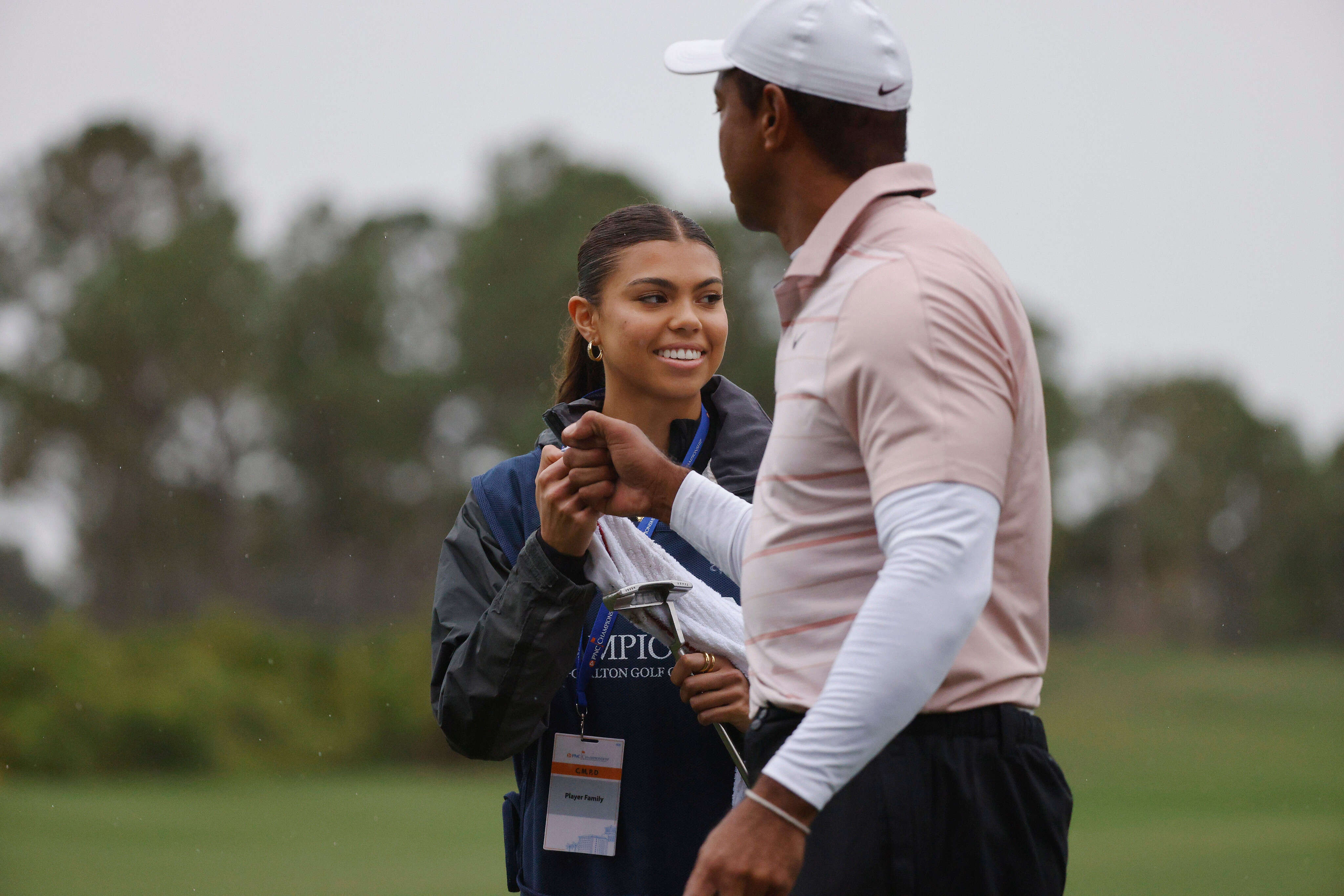 Tiger Woods' 16-year-old daughter Sam acted as his caddie for the first time. Here are 5 photos of the Woods family at the 2023 PNC Championship.