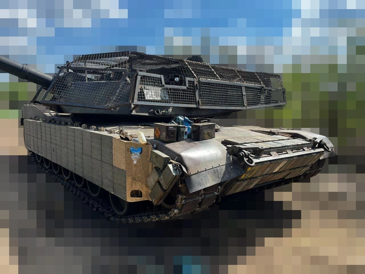 US-made Abrams tanks are fighting a dangerous new kind of war, but Ukrainians are building unusual armor to help them survive it