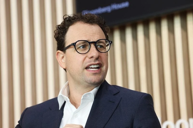 Anthropic CEO Dario Amodei jokes that his company's extreme revenue growth is 'too hard to handle.'