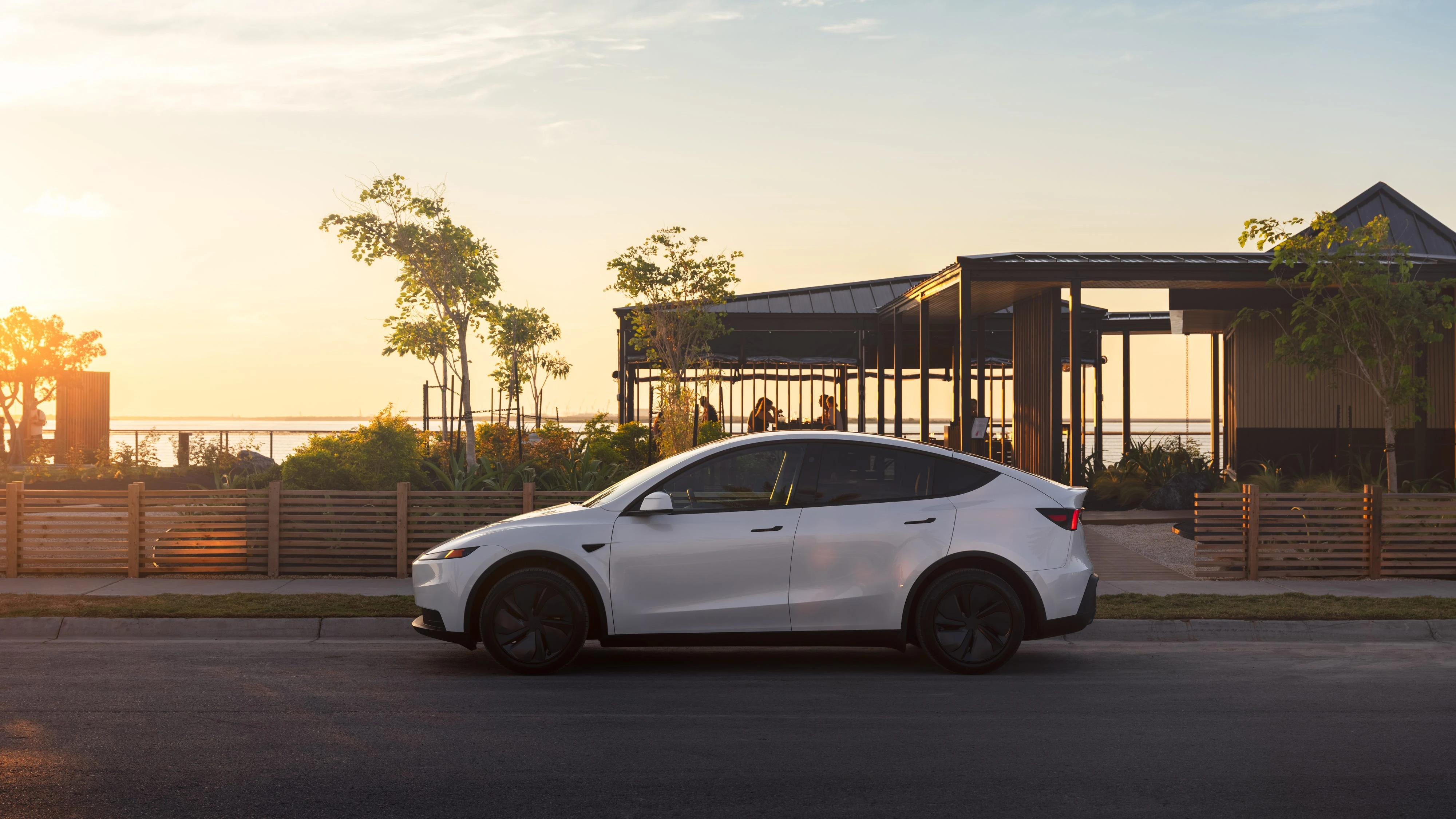 Tesla is selling summer gear, including a $595 Model Y trunk fridge