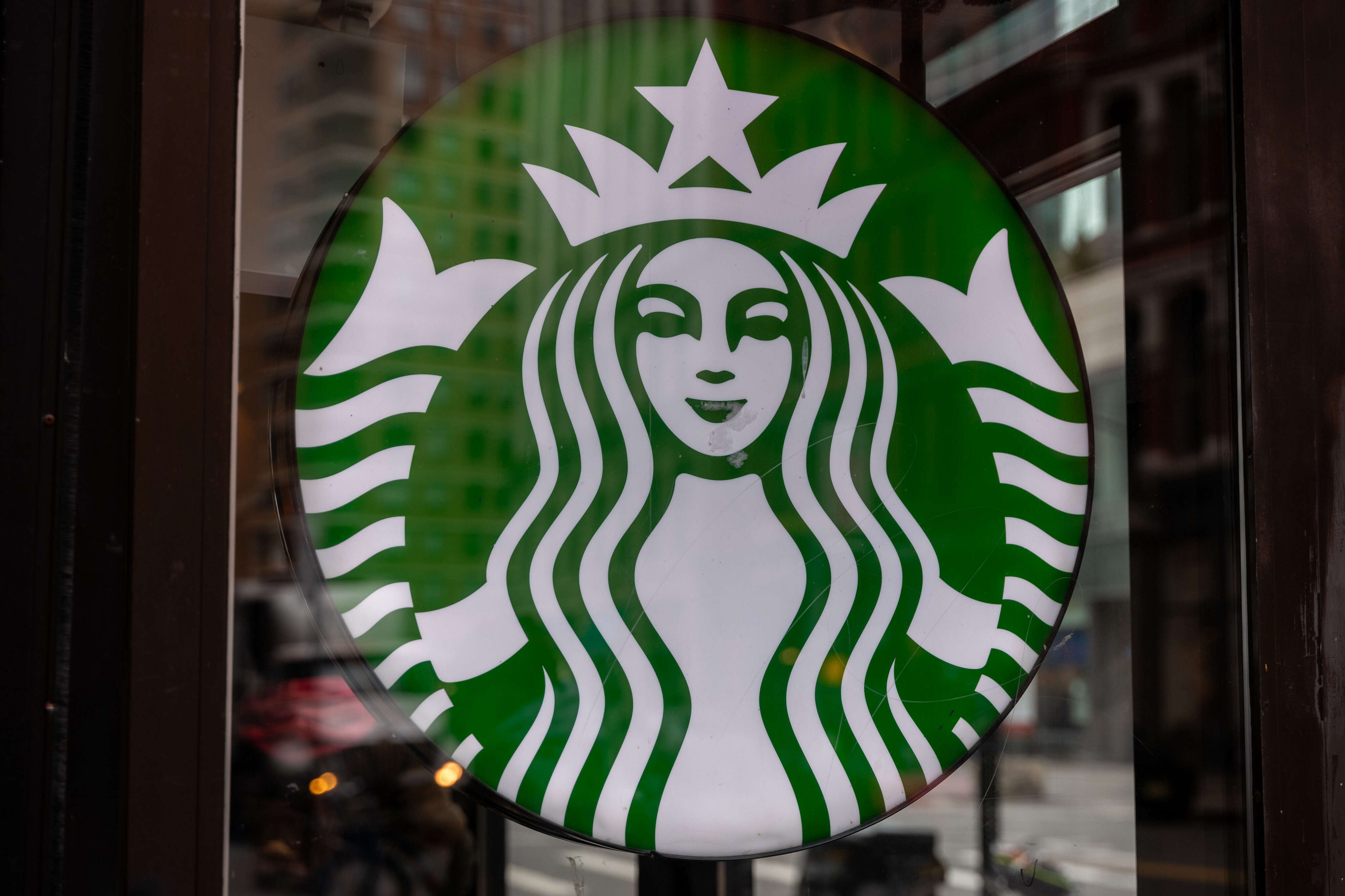 A Starbucks worker of nearly 20 years says the chain has gone from 'quirky coffee shop' to 'soulless fast-food empire'