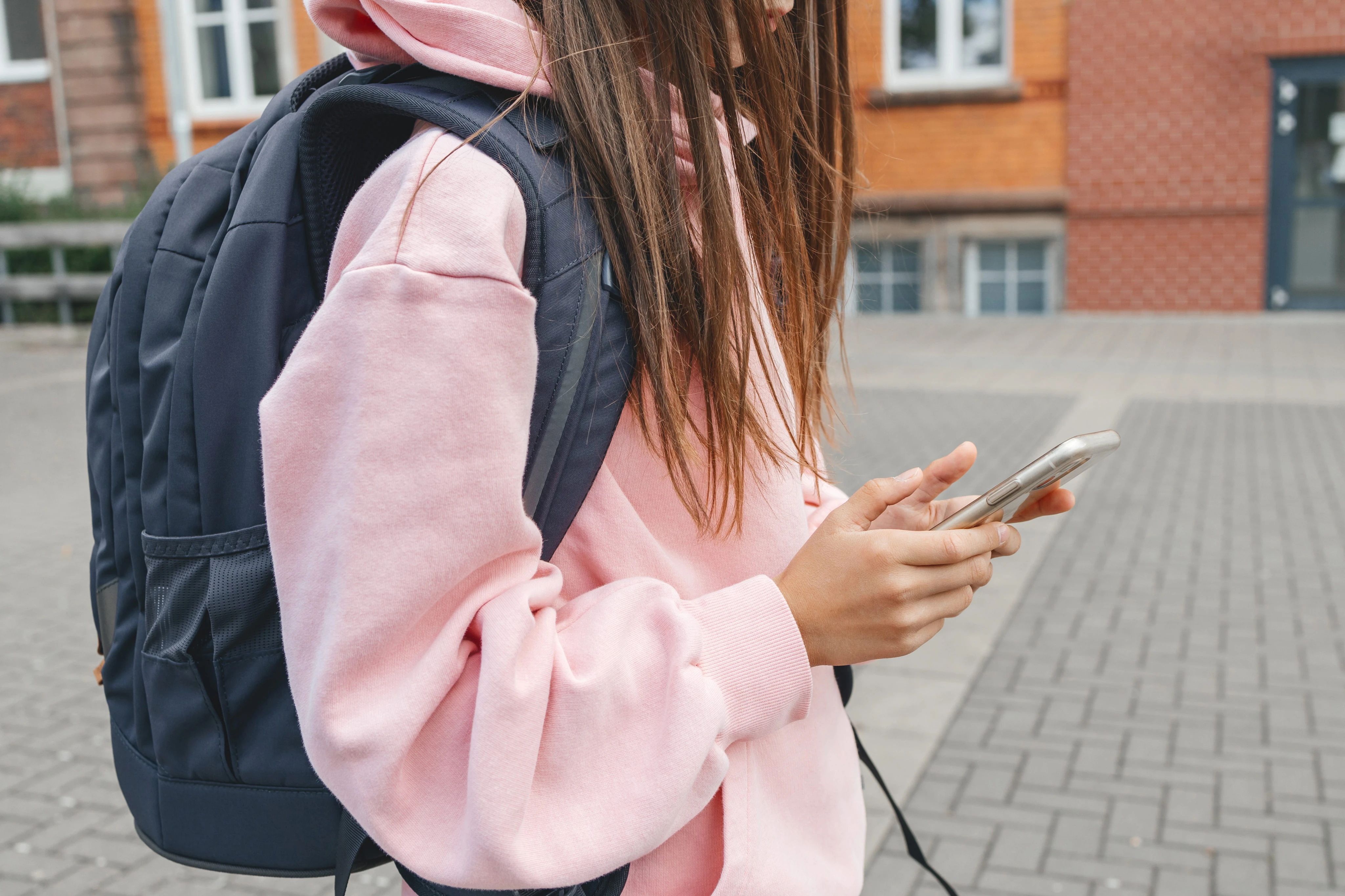 I gave my daughter a cellphone when she was 8. I still don't think they belong in schools.