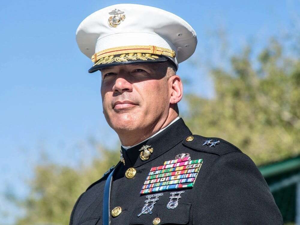 The death of a retired Marine major general is under investigation after his body was found at the training base he once commanded