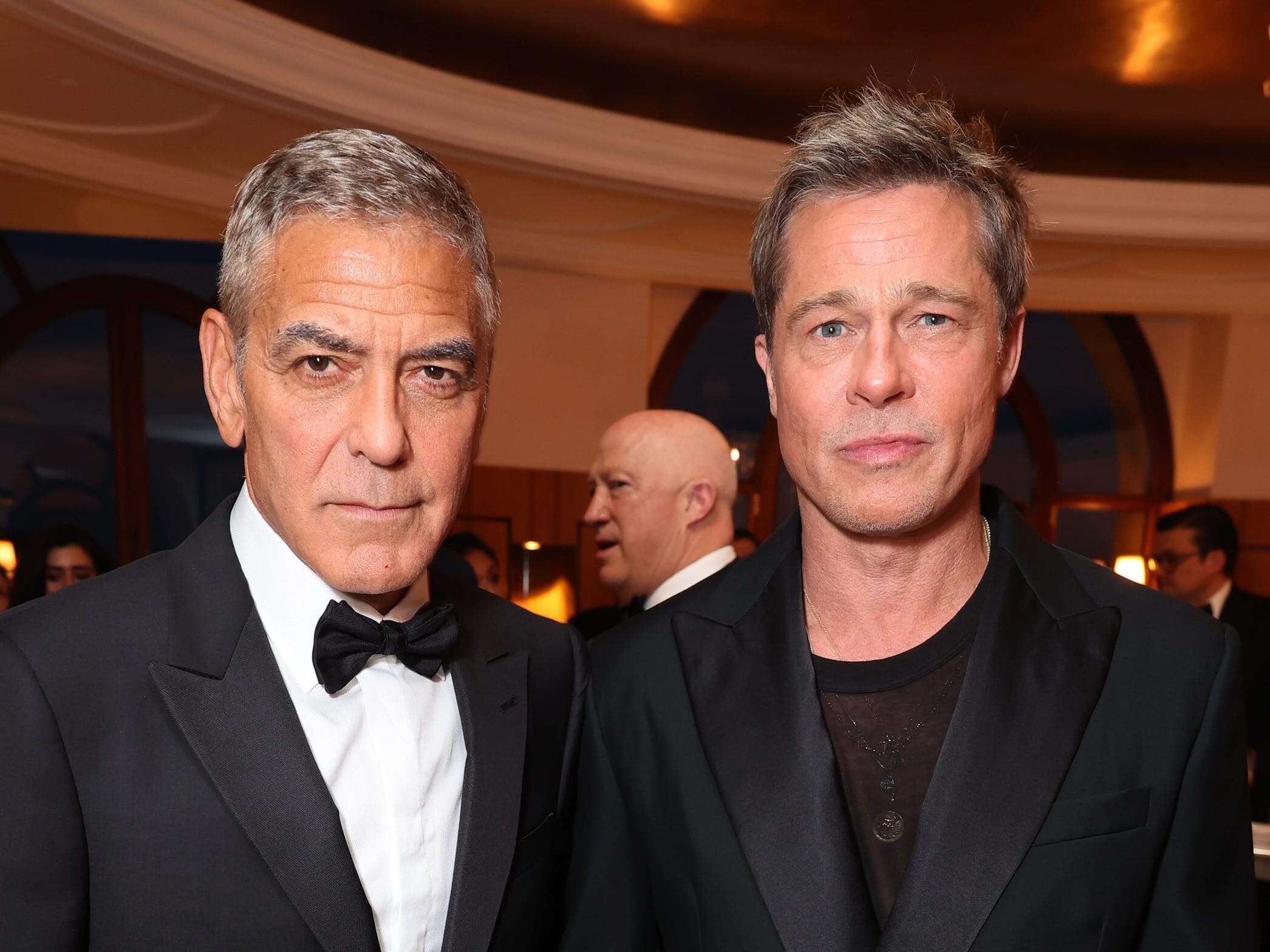 George Clooney denied he and Brad Pitt were each paid $35 million for 'Wolfs.' Here's why they had to return some of their pay.