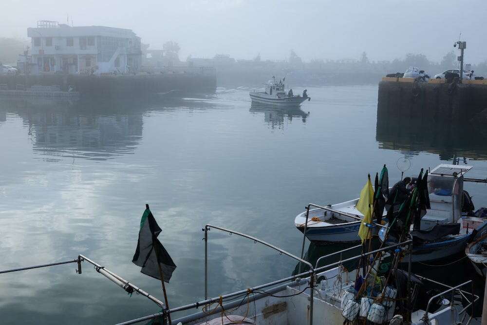 Taiwan says it backed down from retrieving one of its fishing vessels seized by China to avoid escalation