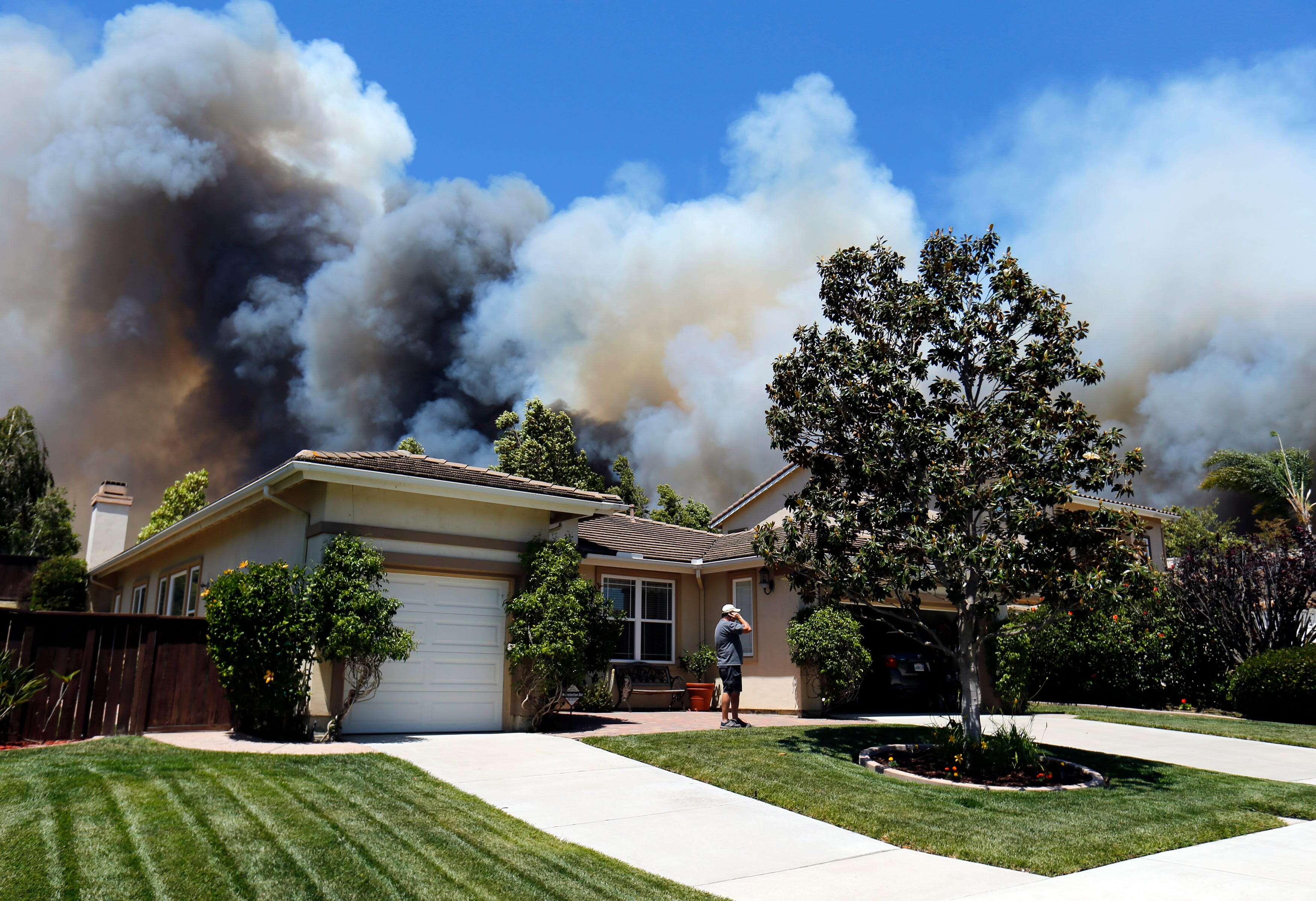 Insurers dropped fire coverage for California homes months ago. Now, wildfires are claiming more houses in Los Angeles.