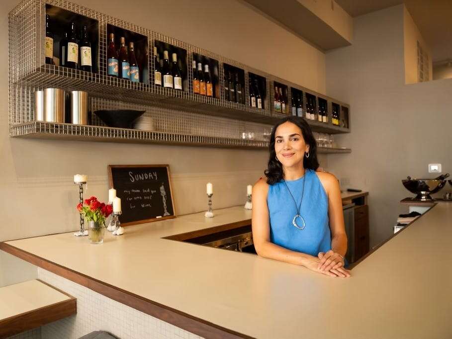 I left my $195,000 tech job to open a wine bar. I work 12-hour days and don't have health insurance, but I've never been happier.