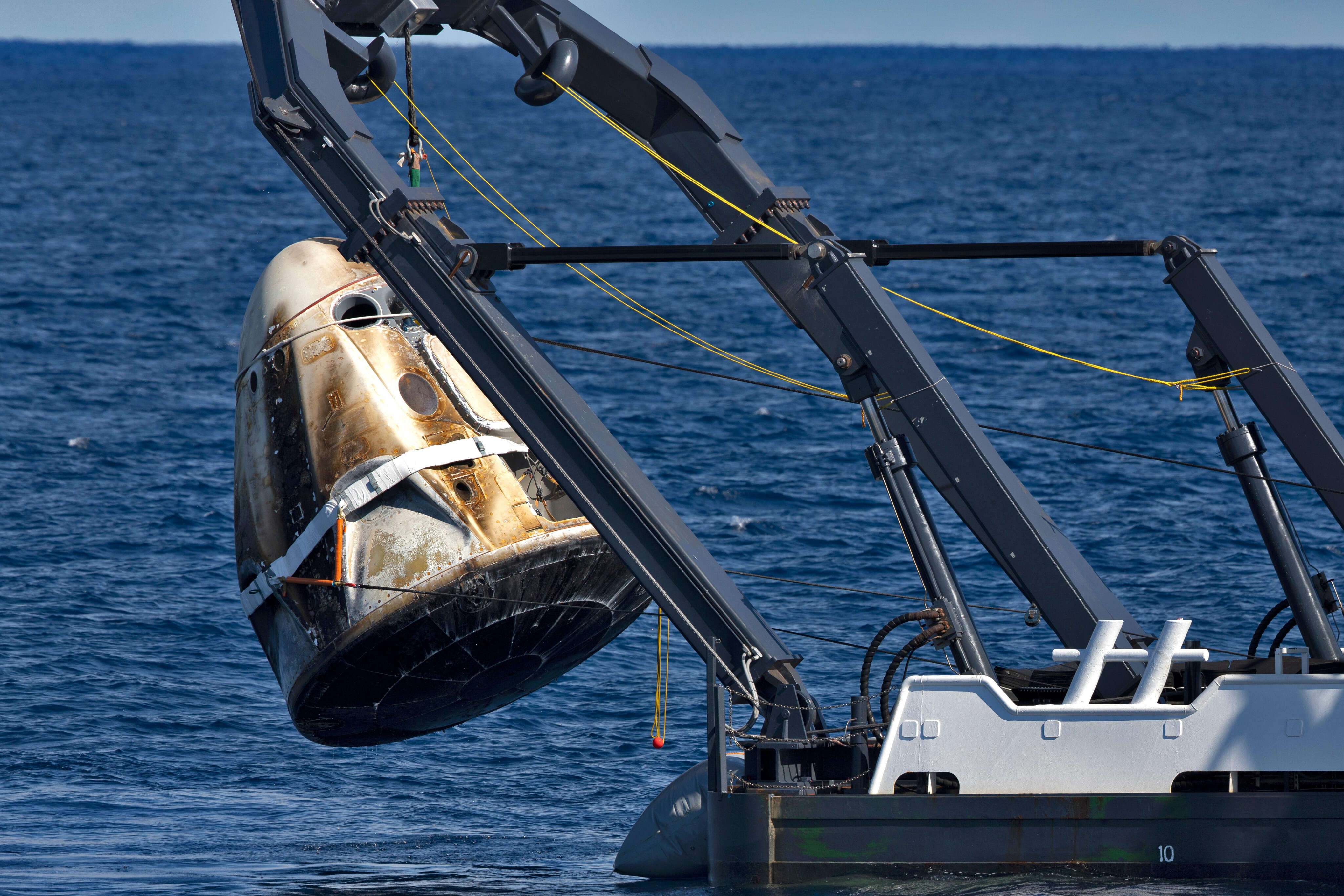 Early SpaceX workers got stuck overnight on an ocean barge with a toxic spaceship, new book reports