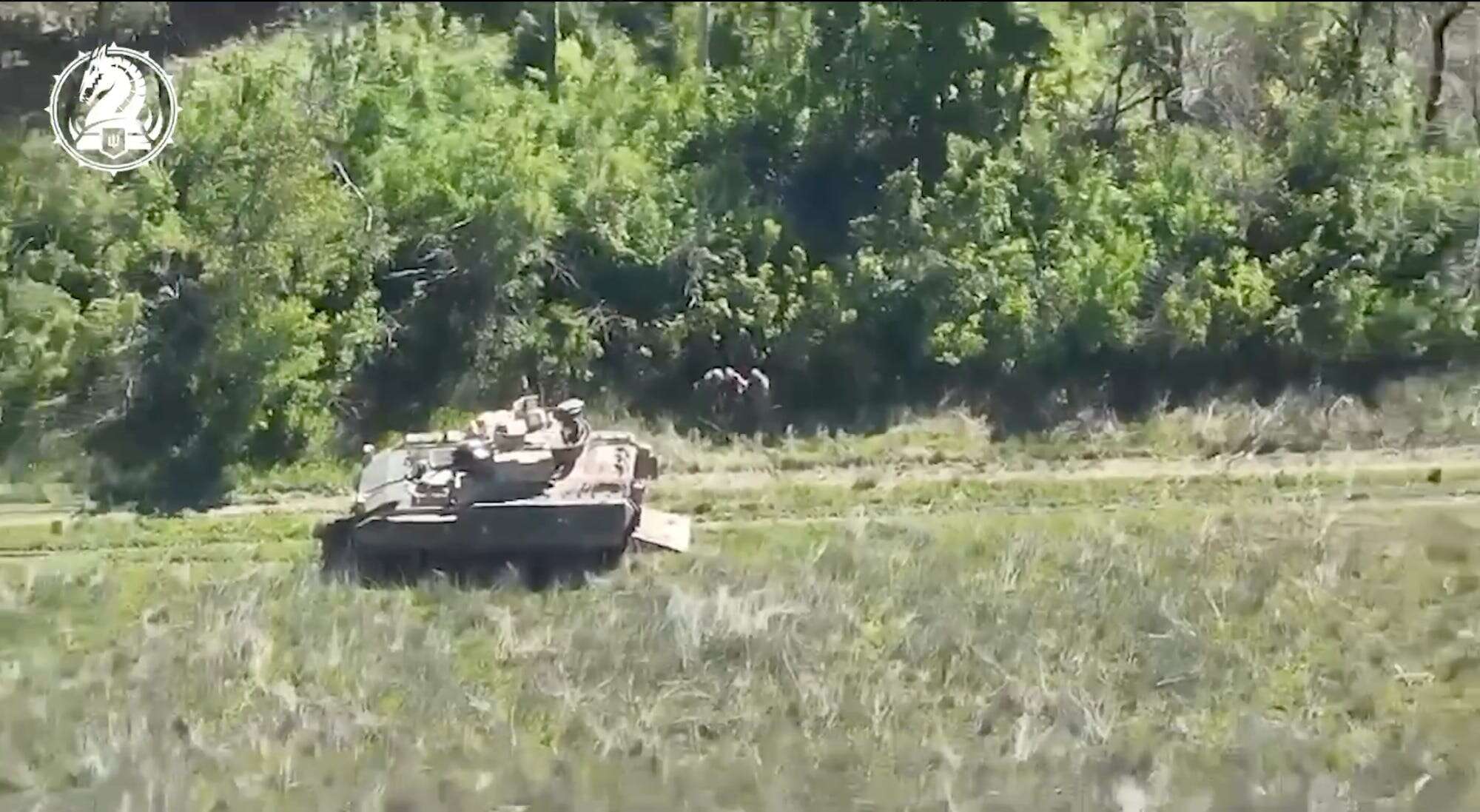 Video shows a wounded Ukrainian soldier being rescued by a US-made Bradley after a friendly drone spotted him  