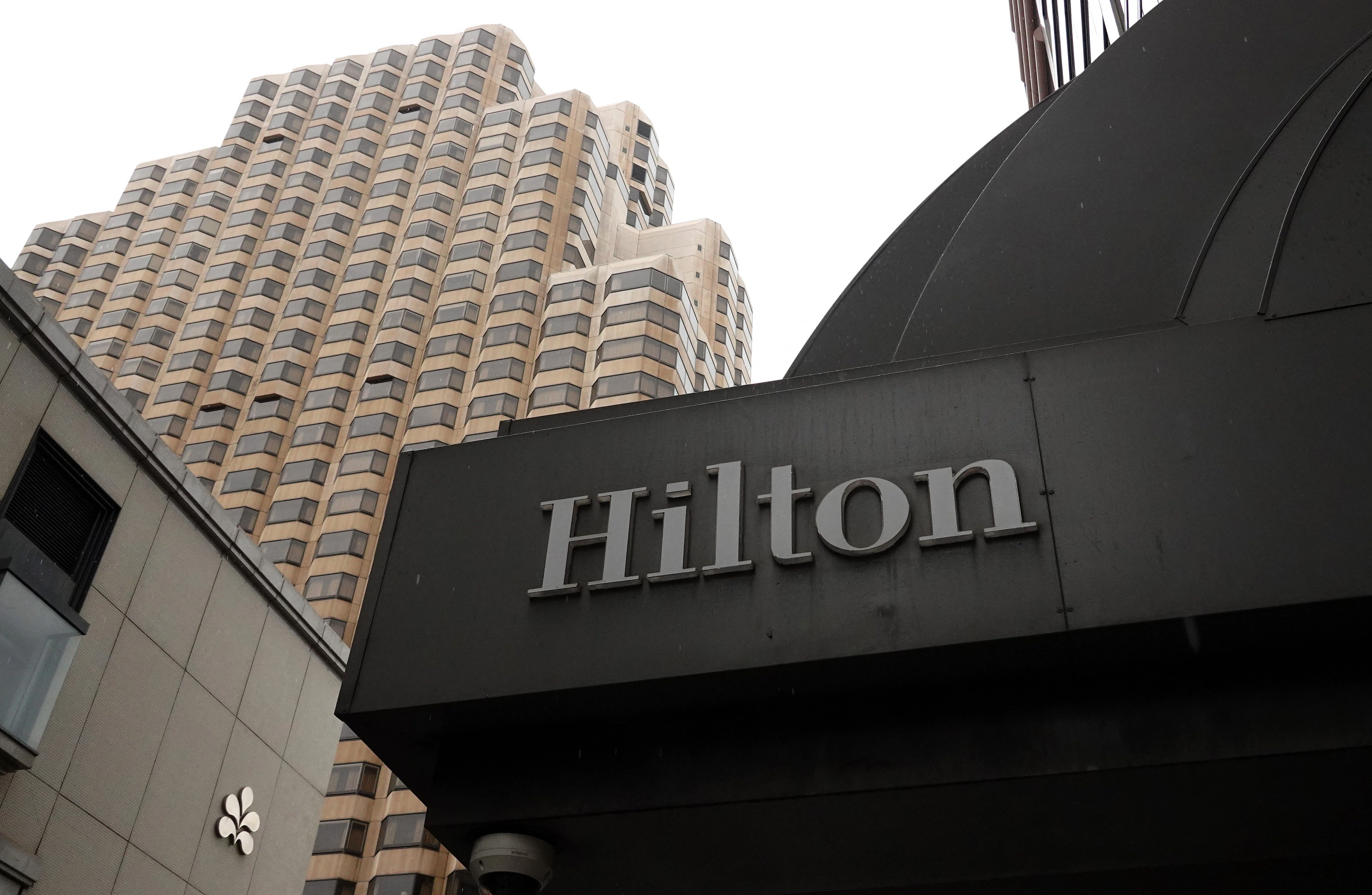 Hilton's CEO says he sees a C-shaped economy emerging in the US