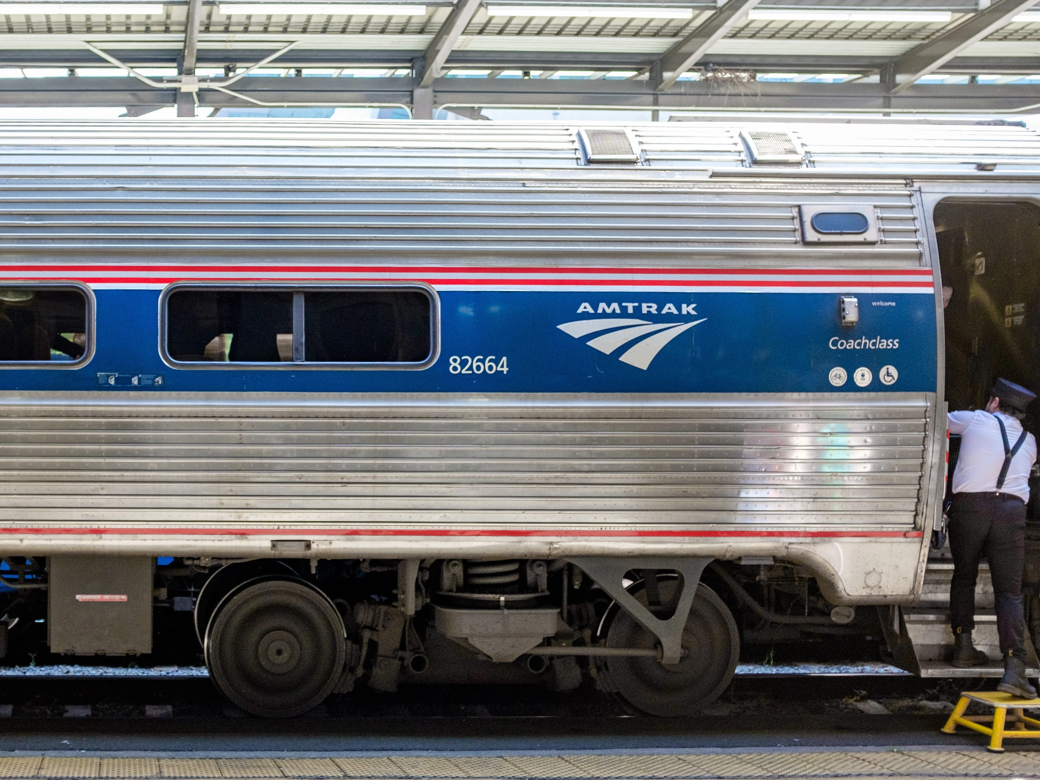 I rode in coach on an Amtrak train from Vancouver to Seattle for $50. It was cheaper and less stressful than flying.