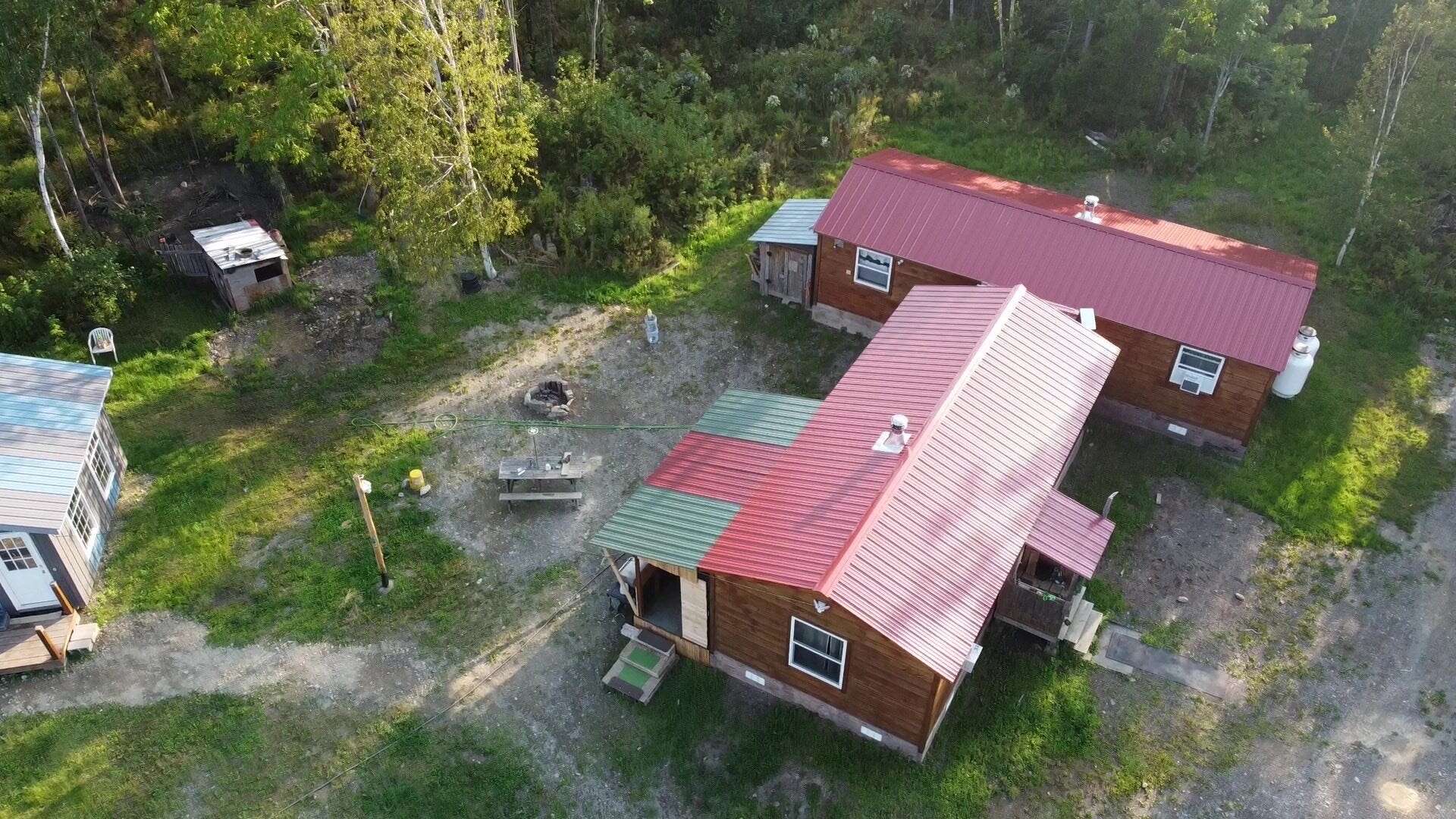 We retired to Maine and turned 2 $12,000 Amish sheds' into our off-the-grid dream home