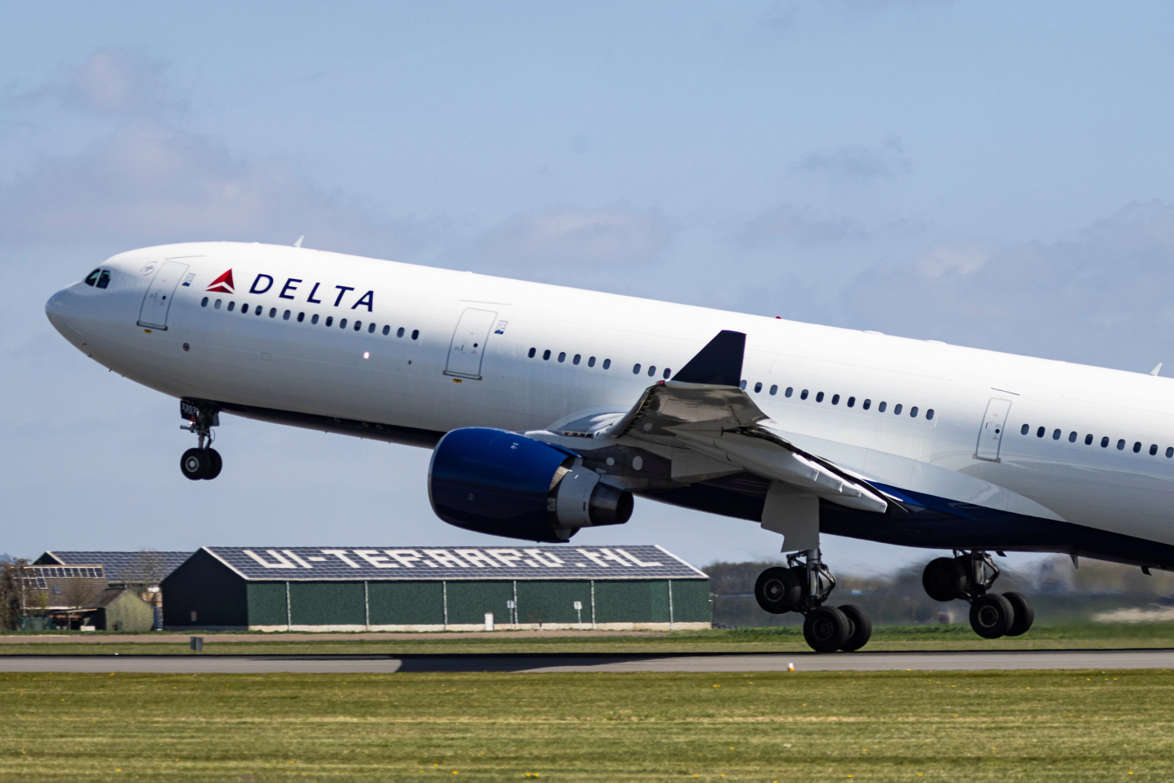 A Delta plane had to U-turn after flying through a hailstorm that seemingly put a dent in its nose
