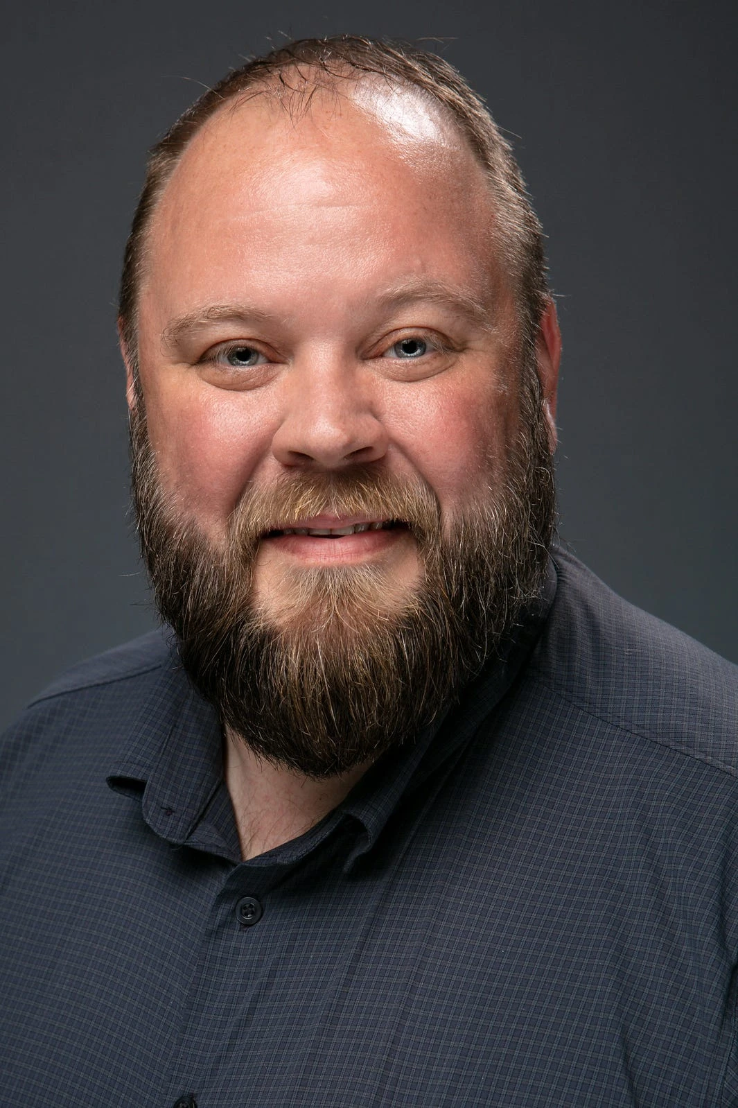 I'm 49 years old and was laid off from my six-figure sales job. I now make $52,000 in an entry-level role where I work alongside college grads.