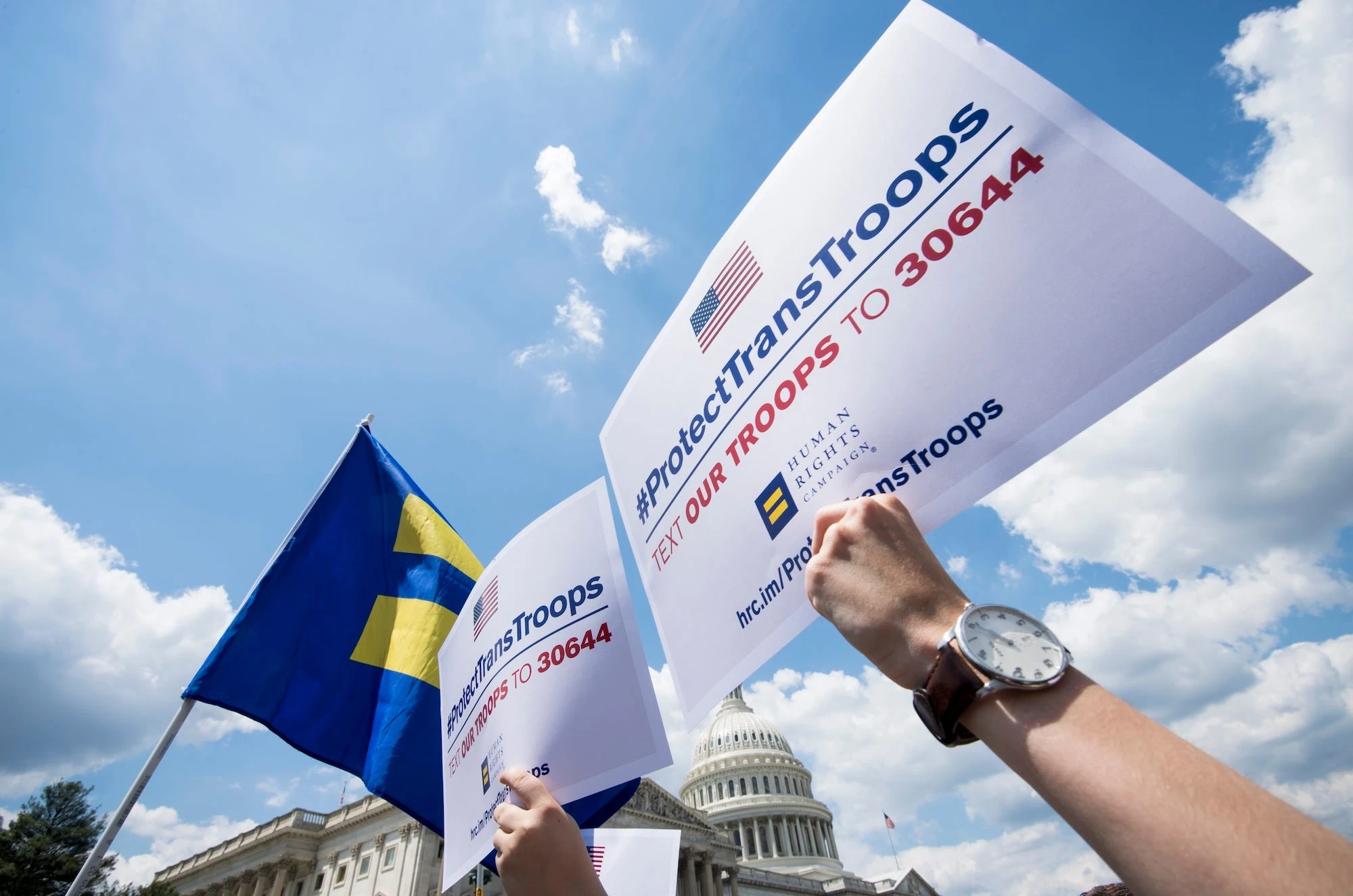 Transgender US troops can continue serving for now, in a major reversal for Trump