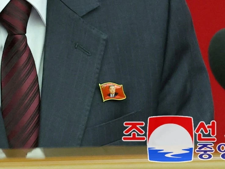 North Koreans have a new fashion accessory — Kim Jong Un lapel pins. Here's what they mean for the supreme leader's legacy. 