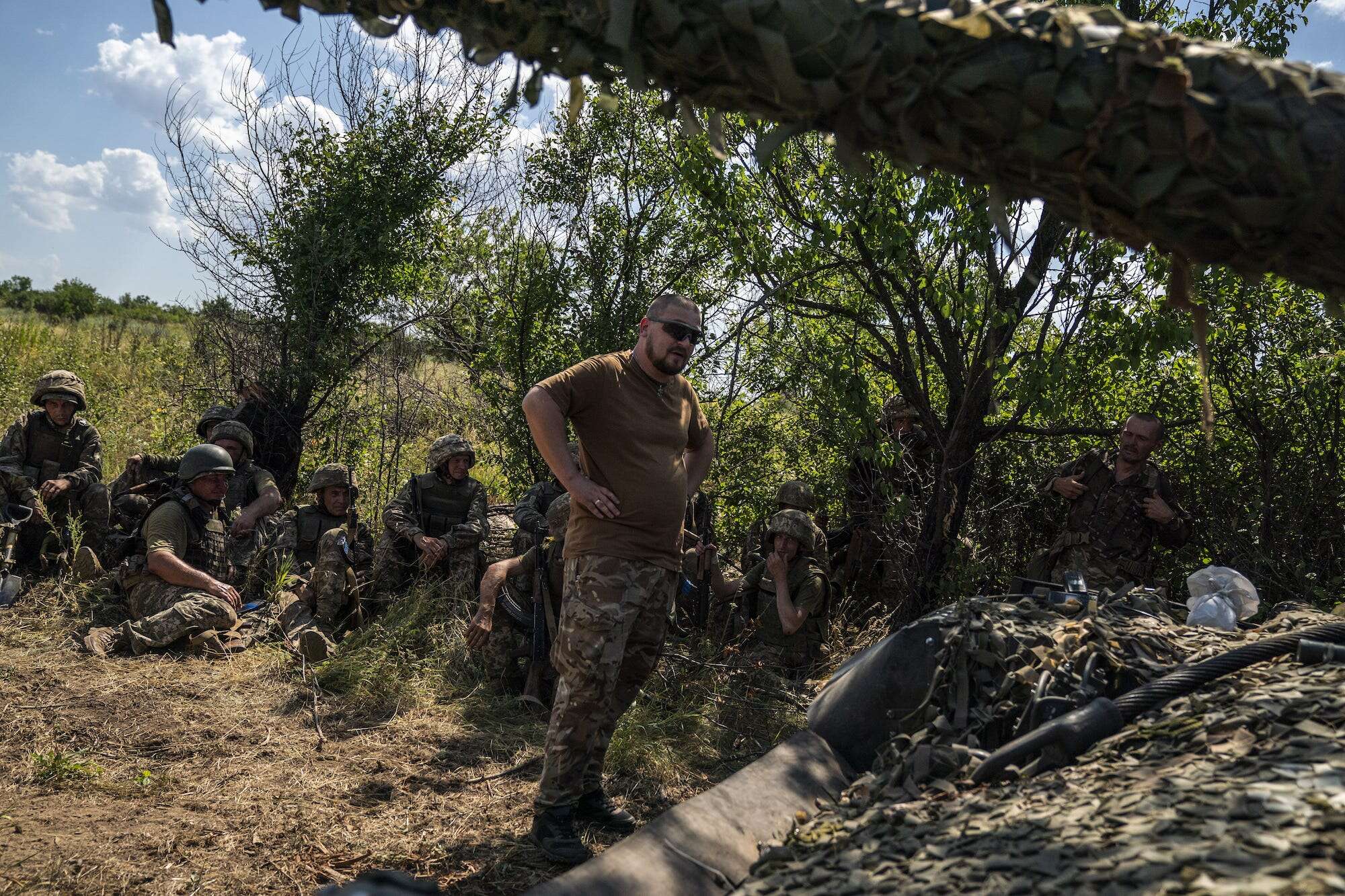 Ukraine is forming new army brigades but is unable to supply them all, military experts say