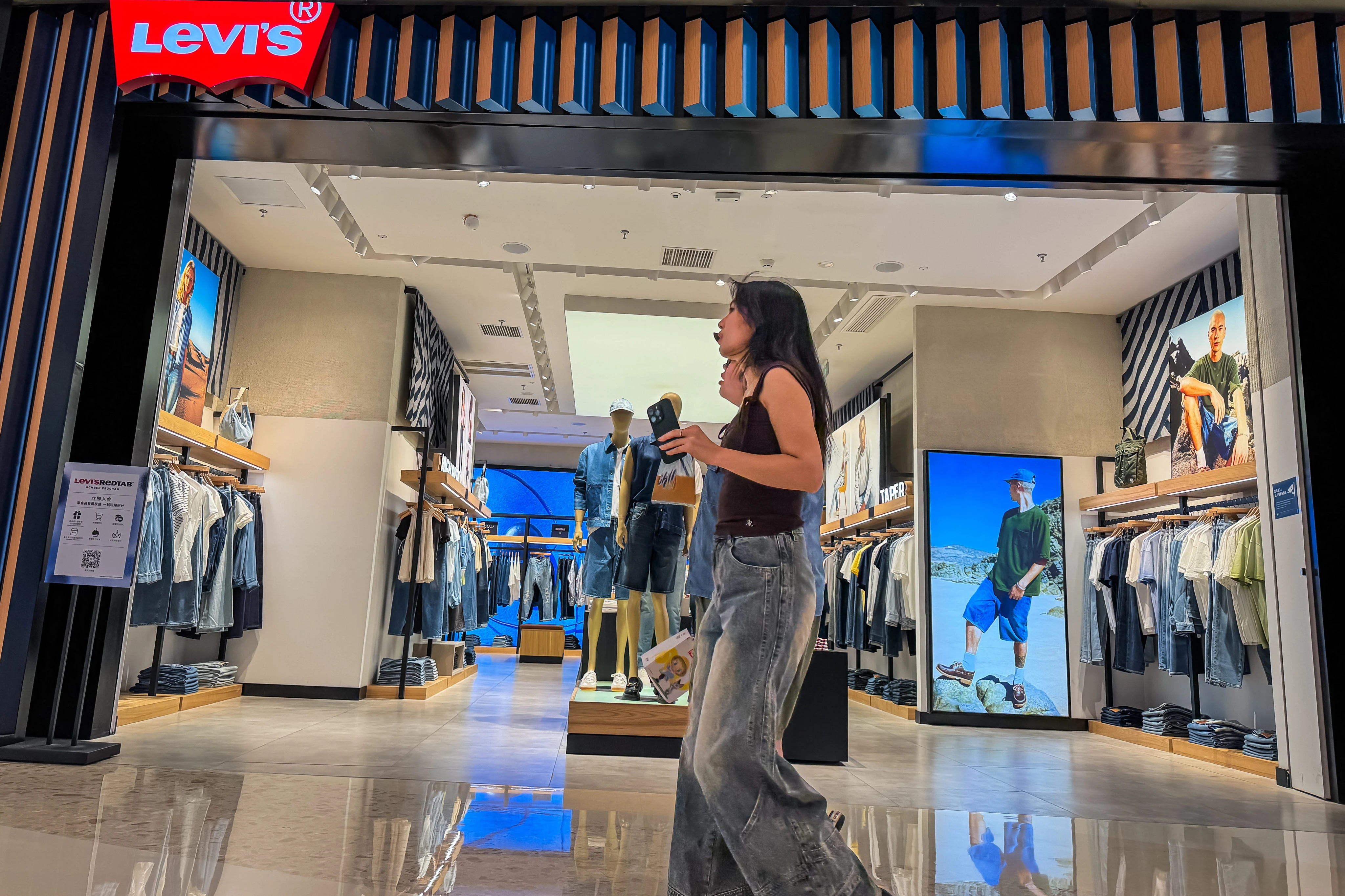 Jeans brand Levi's is up 8% on strong earnings — despite a profit hit from tariffs