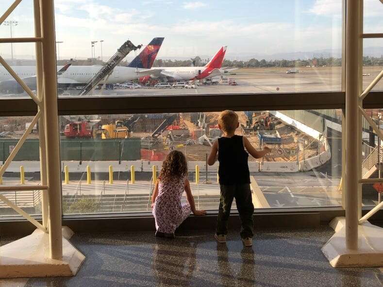 I didn't fly with my twins until they were 2. I wish we'd started when their plane tickets would've been free.