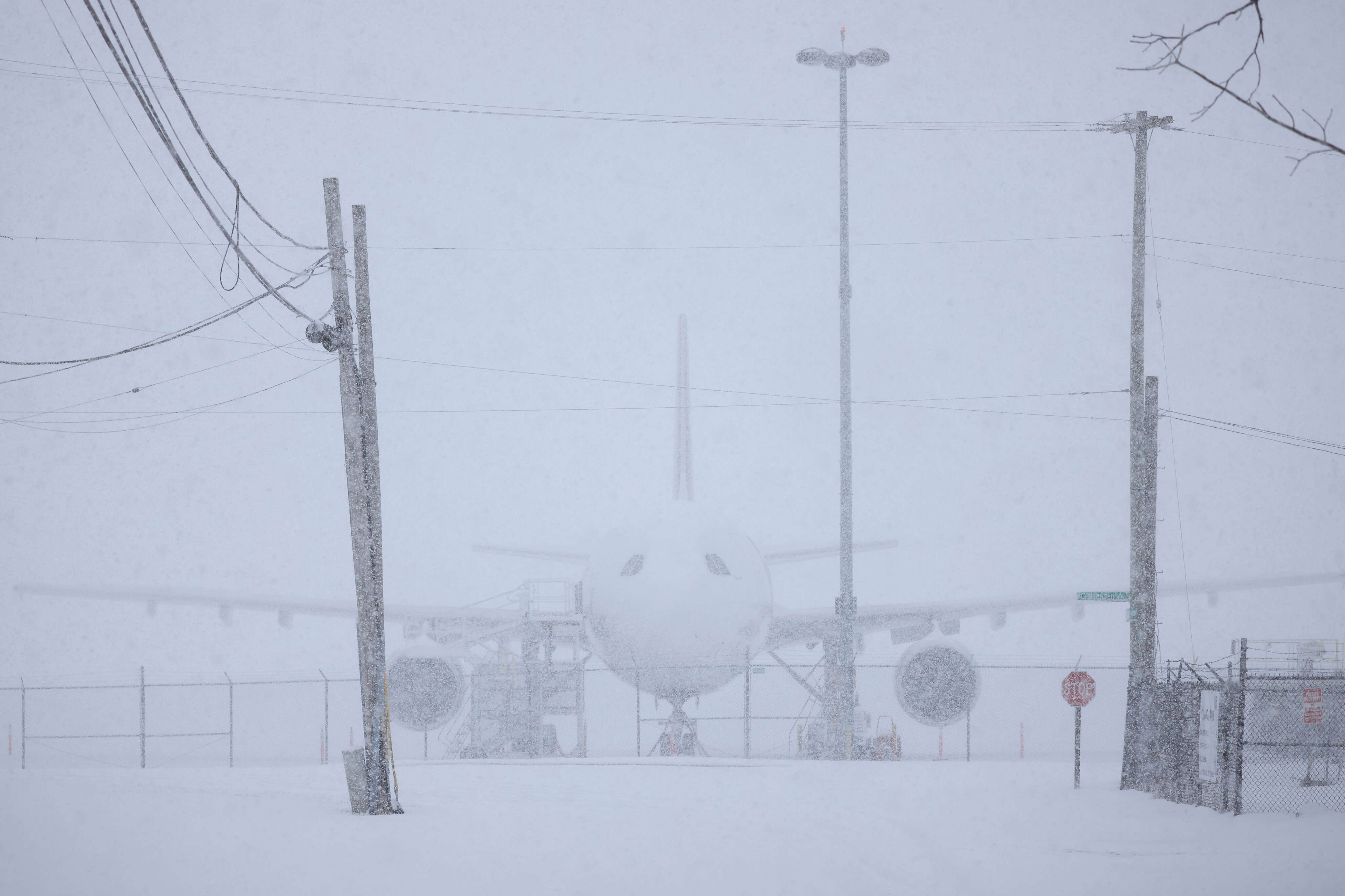 Over half of flights have been canceled in Washington, DC as Storm Blair brings heavy snowfall