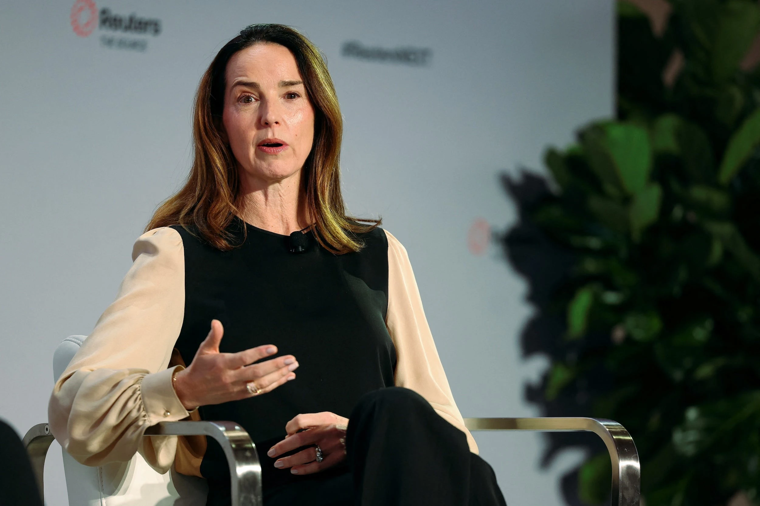 OpenAI's CFO says she can't say if Jony Ive's device is an earpiece