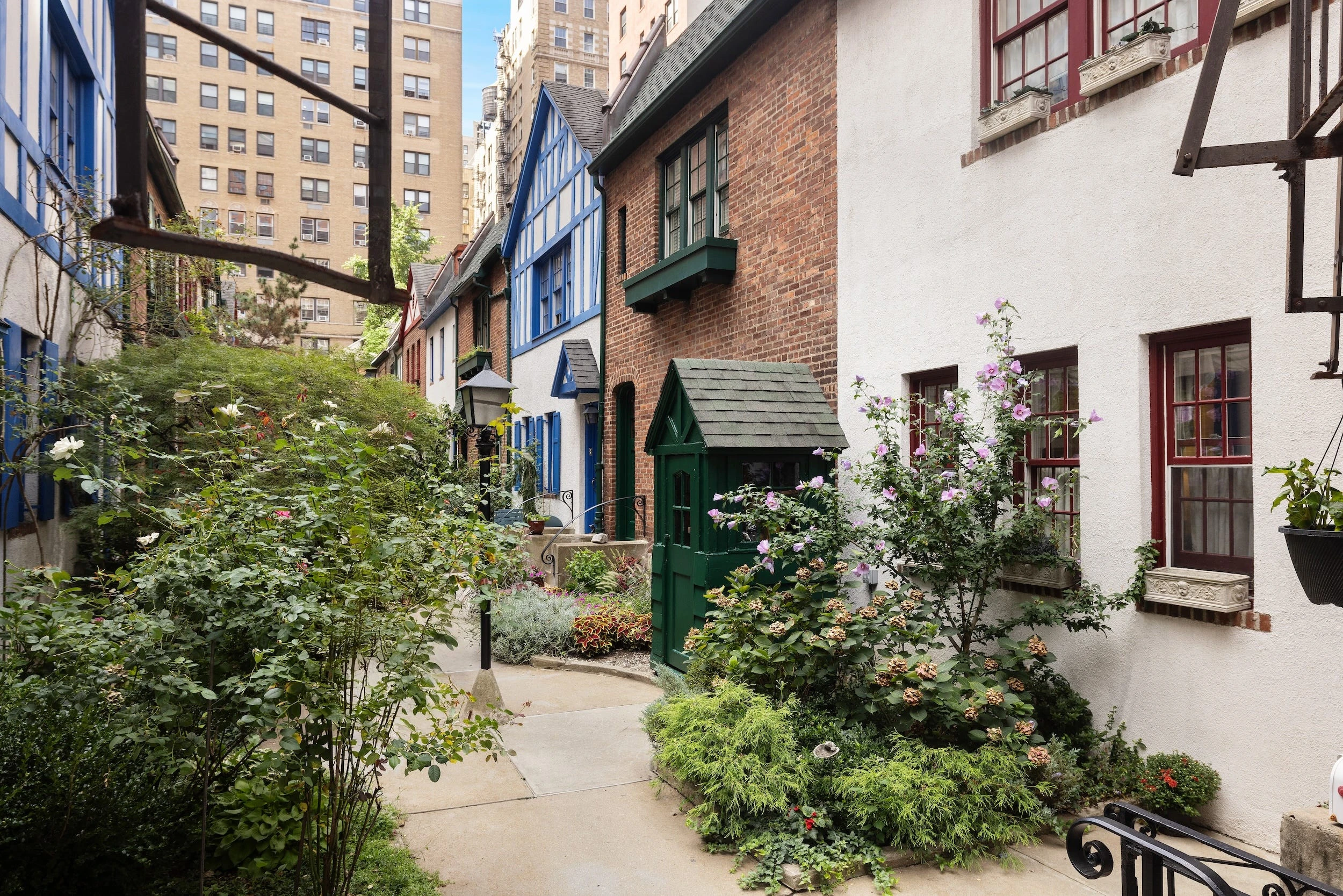 This hidden street in New York City looks like the European countryside — and two condos on it are for sale