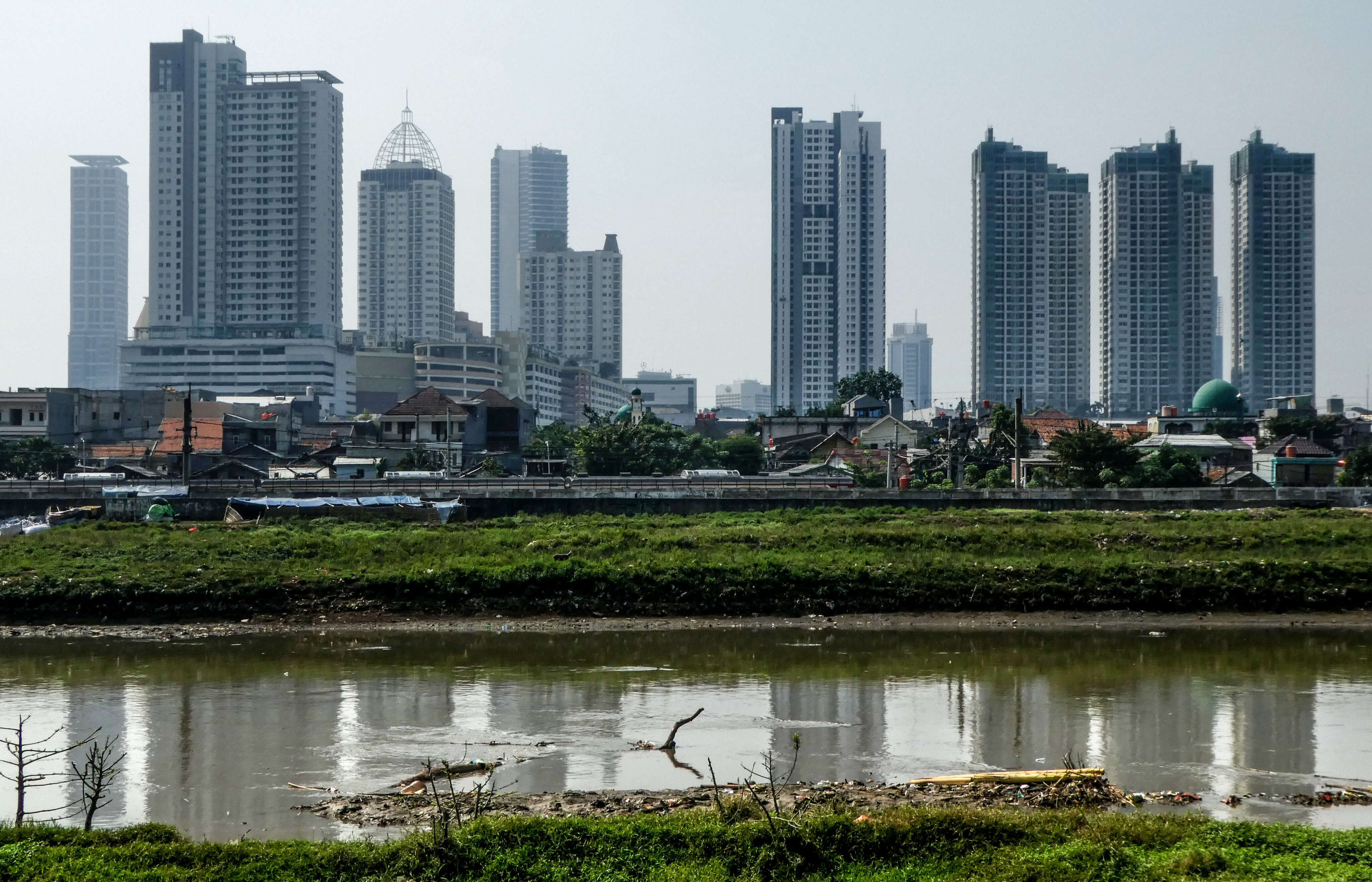 Indonesian tycoons are trying to build a new city, complete with a port, a theme park, and an F1 racetrack