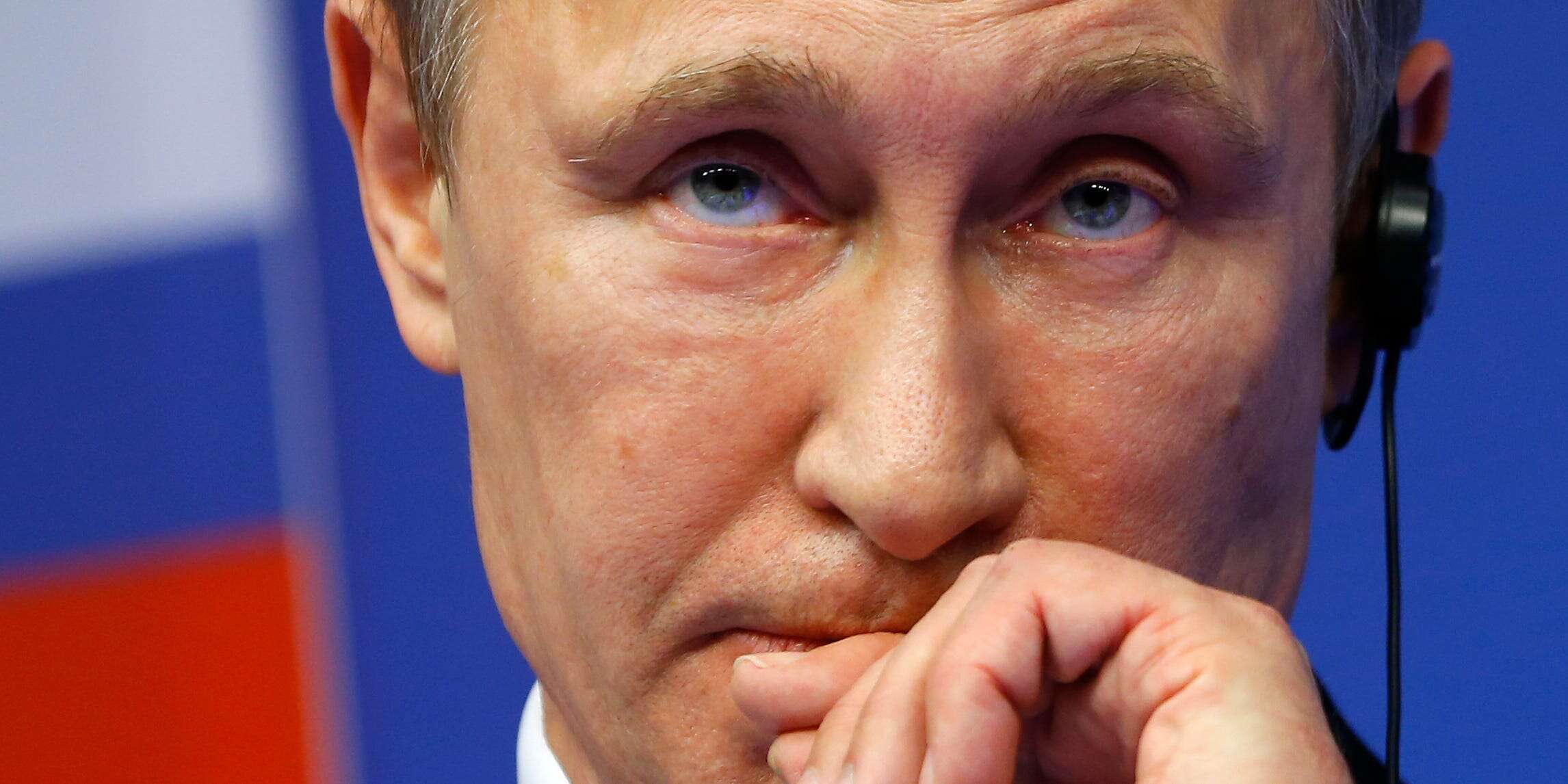 Putin tells Russians there's no reason to panic as the ruble sinks, but analysts say its economy is in trouble