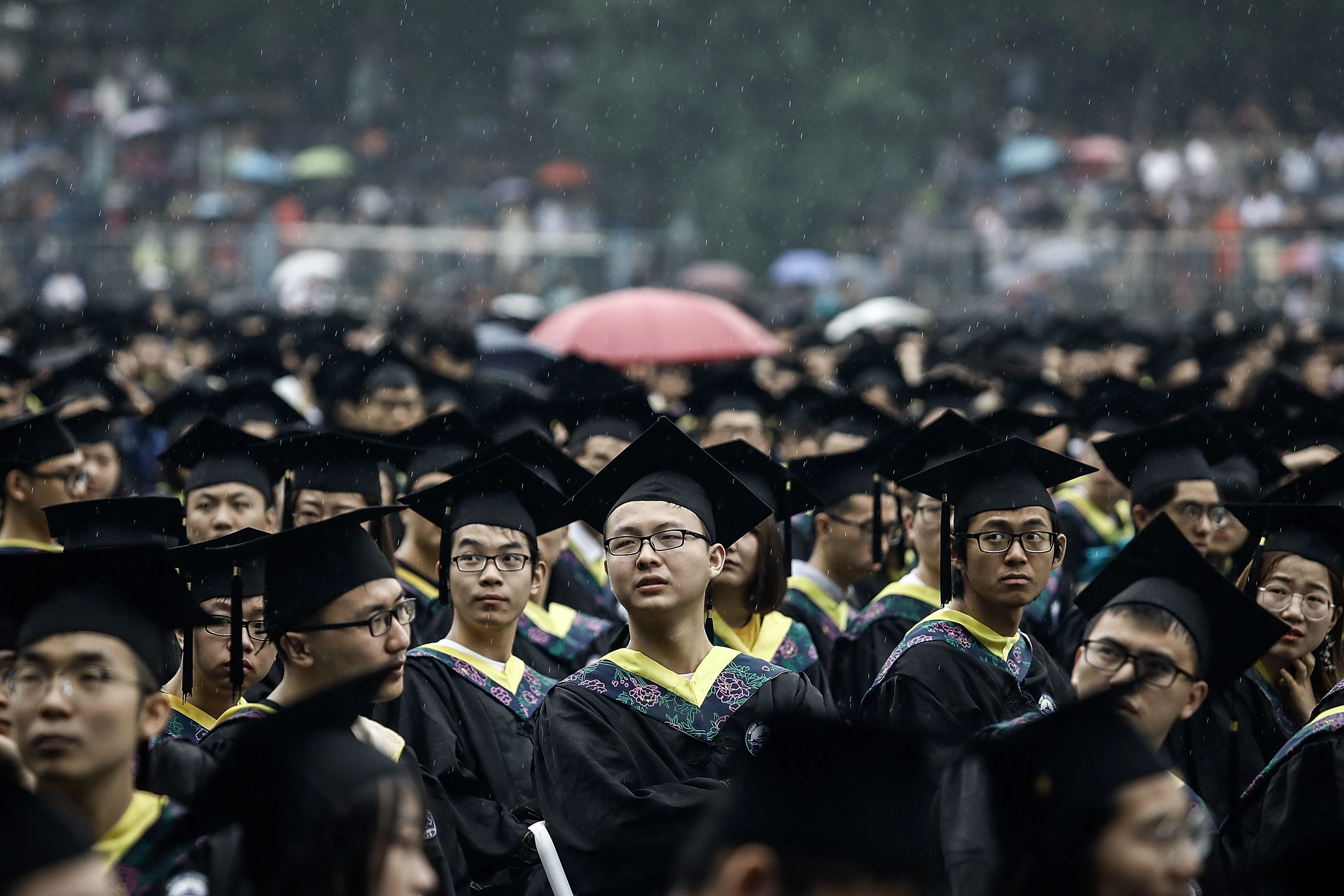 China's broke and burned-out young workers are coming together under a new banner: 'rat people'
