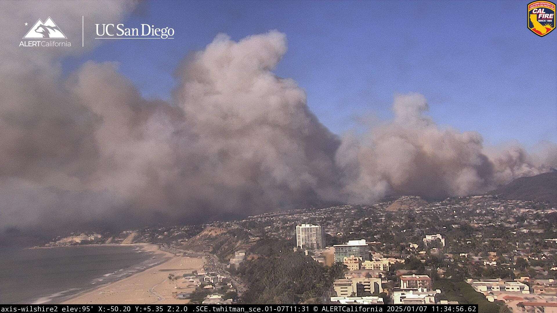 200-acre brush fire erupts in affluent Pacific Palisades neighborhood of Los Angeles, prompting mandatory evacuations