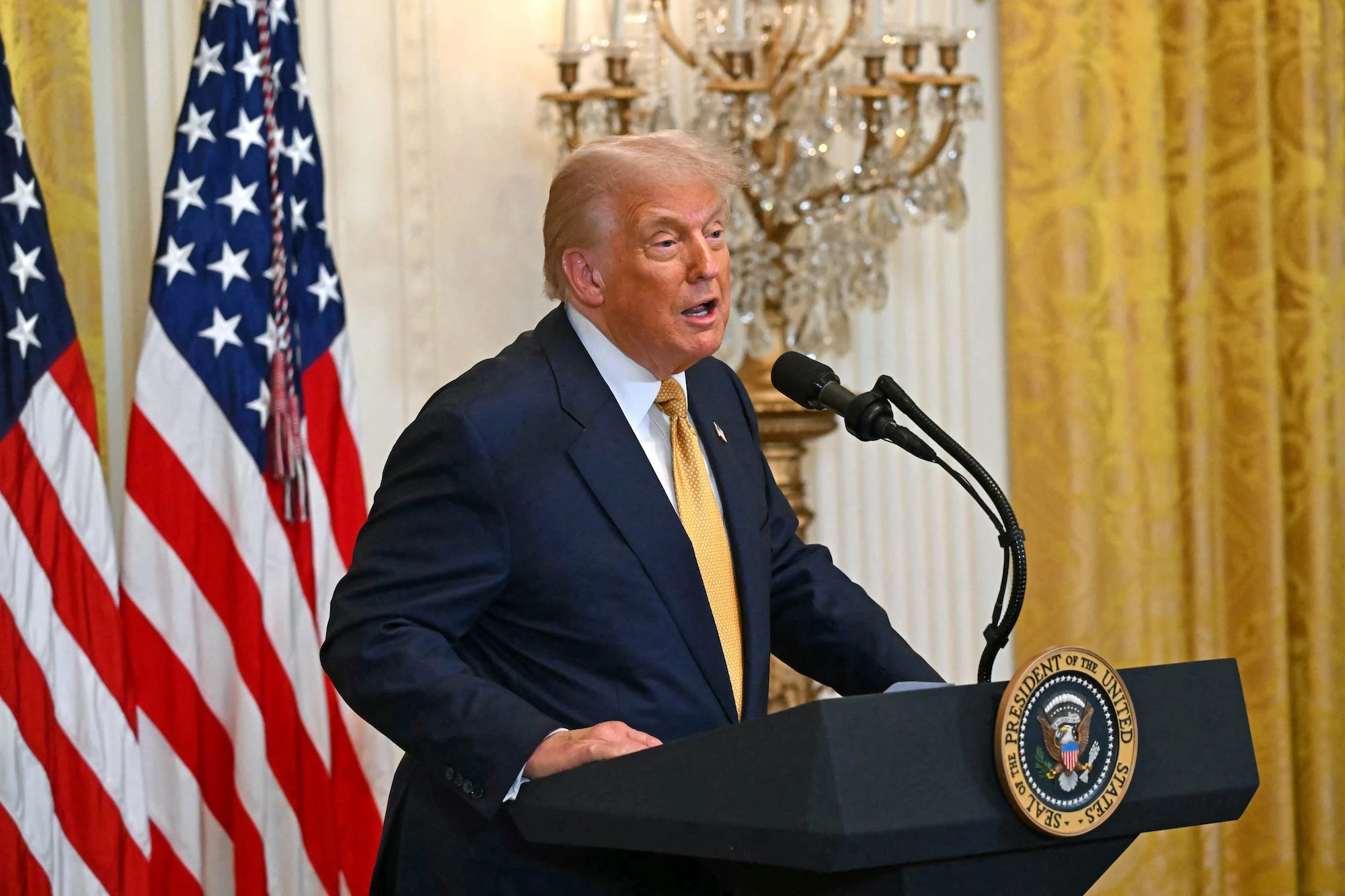 States with strict AI laws could see federal dollars withheld under Trump's new AI plan