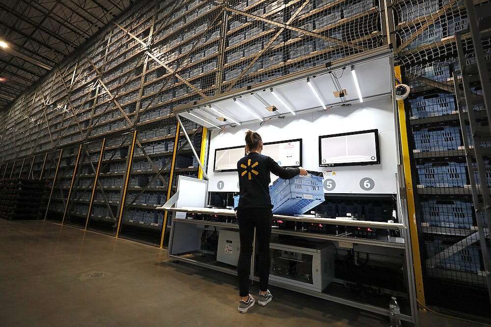 Walmart says automating its warehouses will actually give workers longer careers