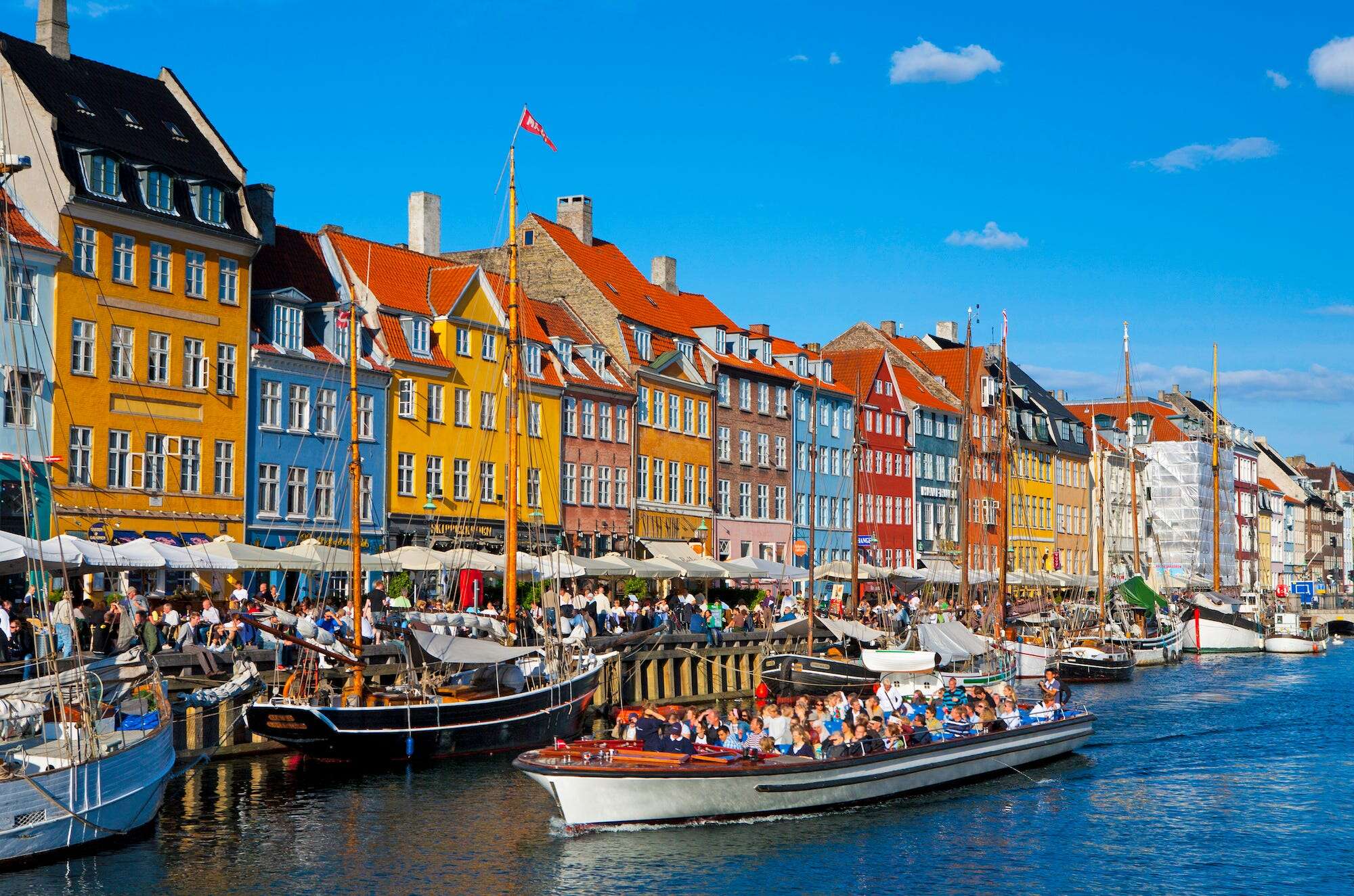 Copenhagen may have cracked how to get tourists to behave: Free glasses of wine and kayaking