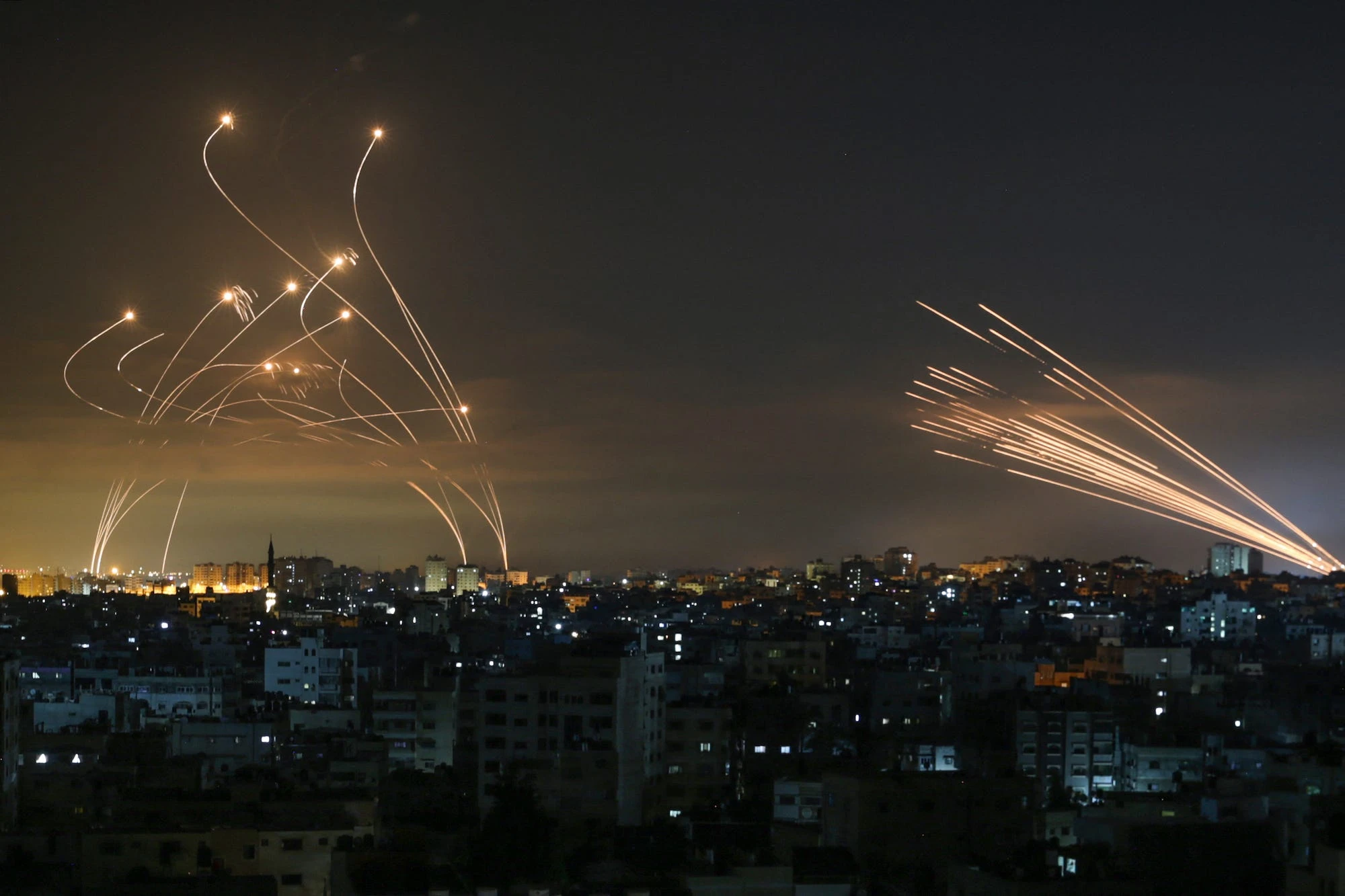 Dramatic video of a passenger plane landing at Tel Aviv airport amid a barrage as Iron Dome missiles fought off Hamas rockets   