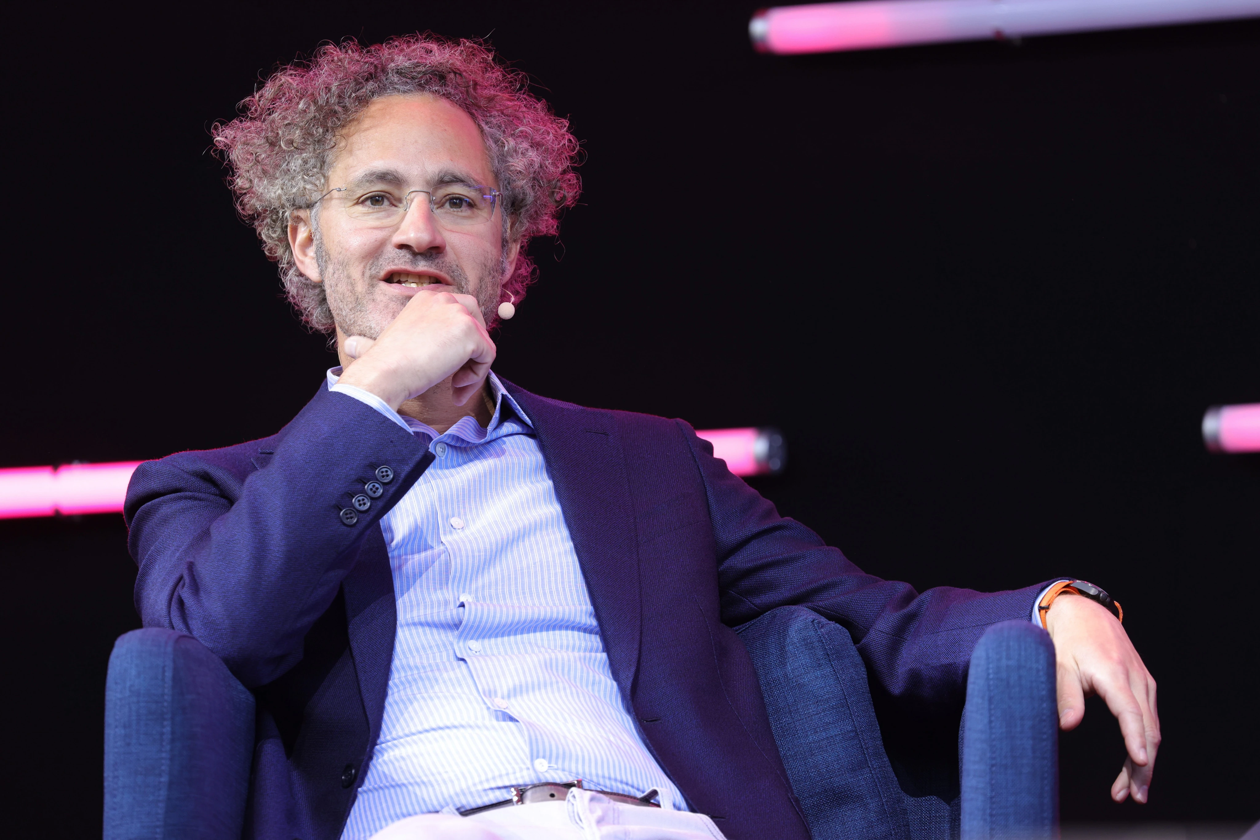 Palantir CEO Alex Karp takes a shot at elite colleges and says the company offers 'a new credential independent of class'