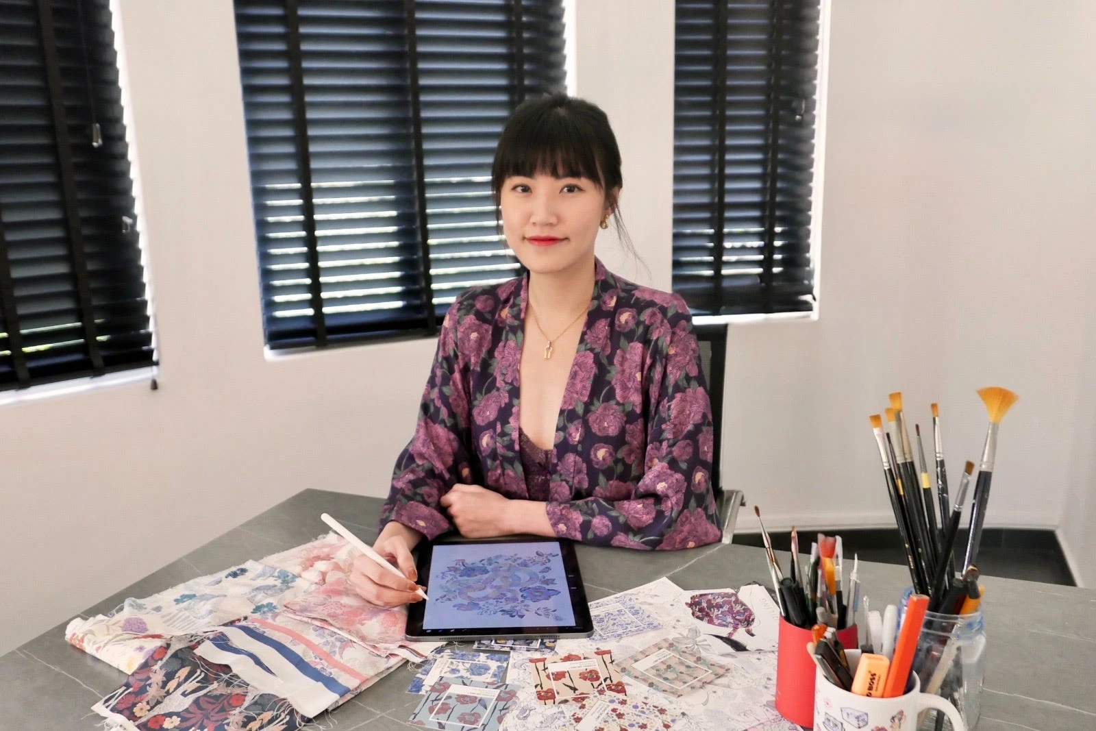 I was an in-house artist at Goyard and Louis Vuitton. Now, I use AI to market my silk brand.
