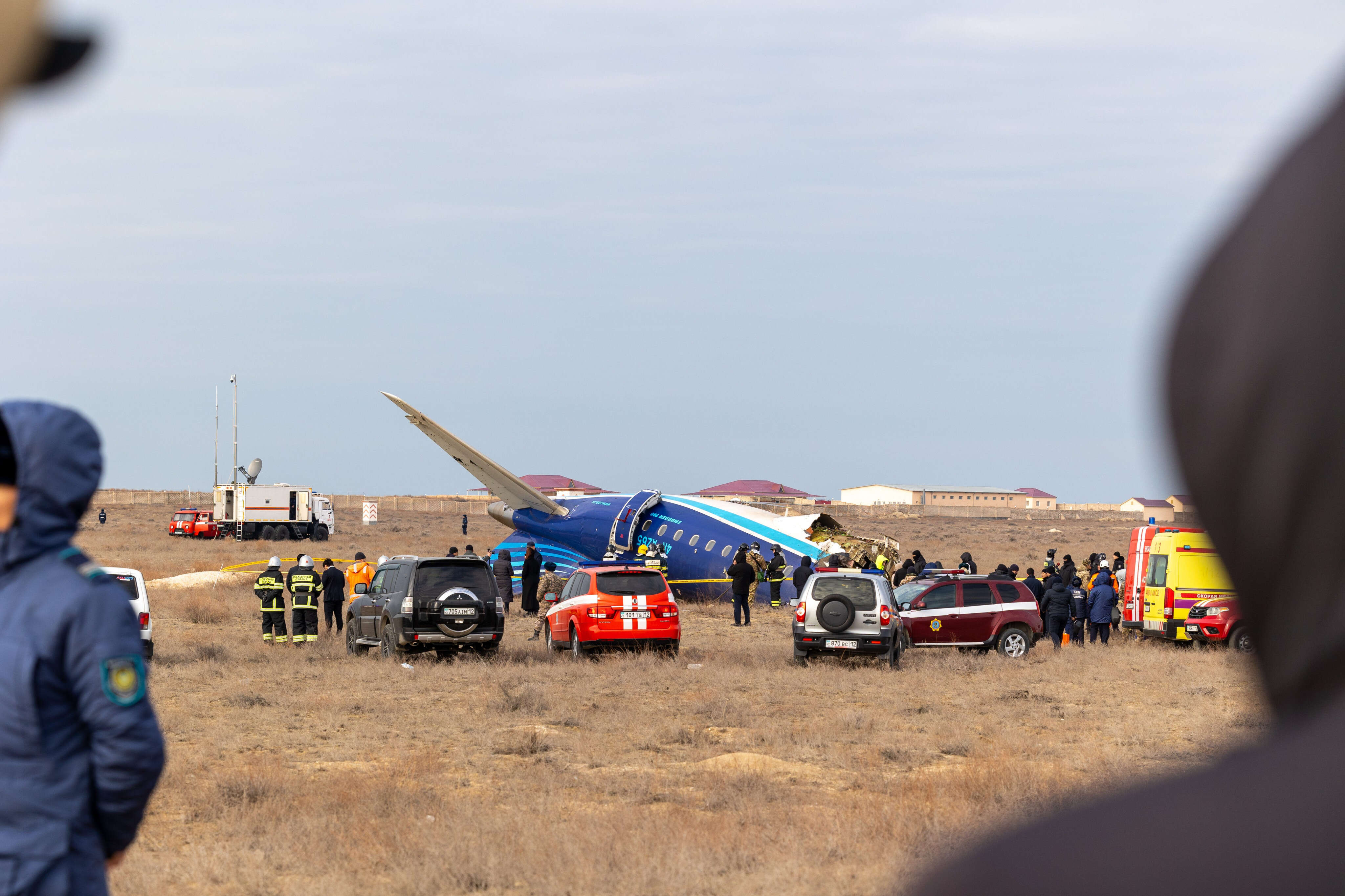 Airline praises pilots in crash-landing where both died but nearly half the passengers survived